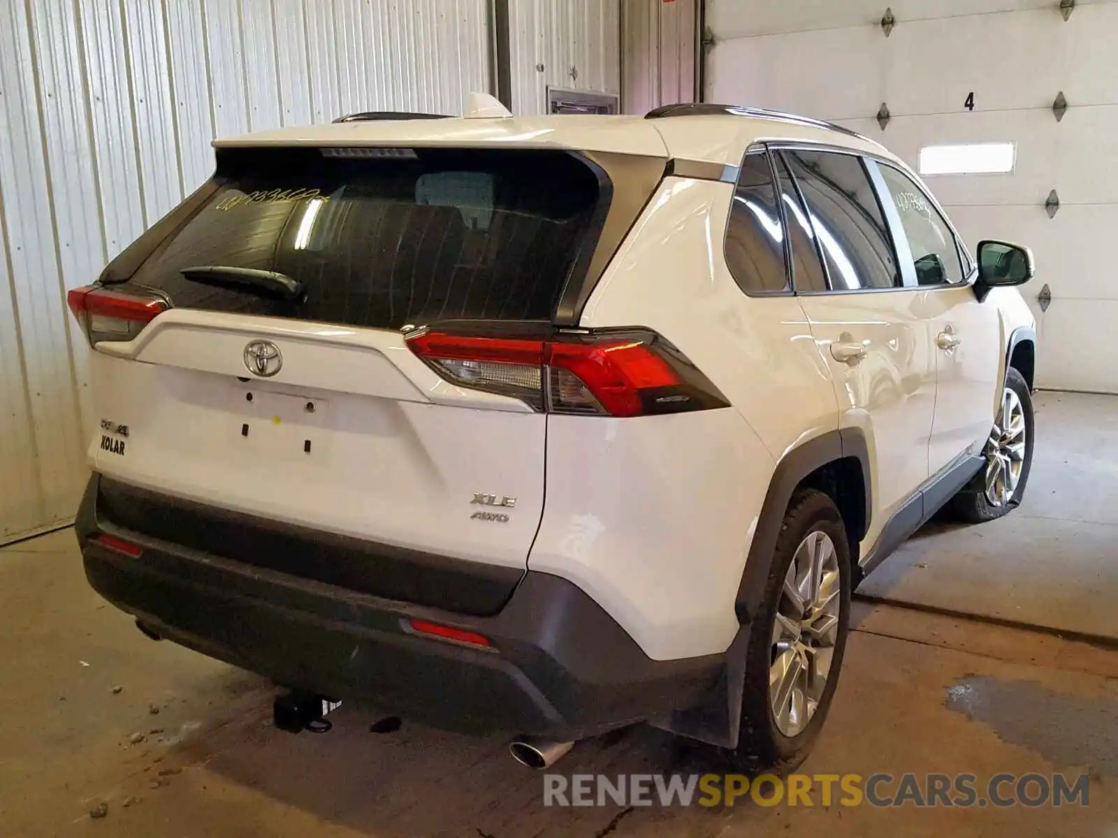 4 Photograph of a damaged car JTMA1RFV7KD013803 TOYOTA RAV4 XLE P 2019