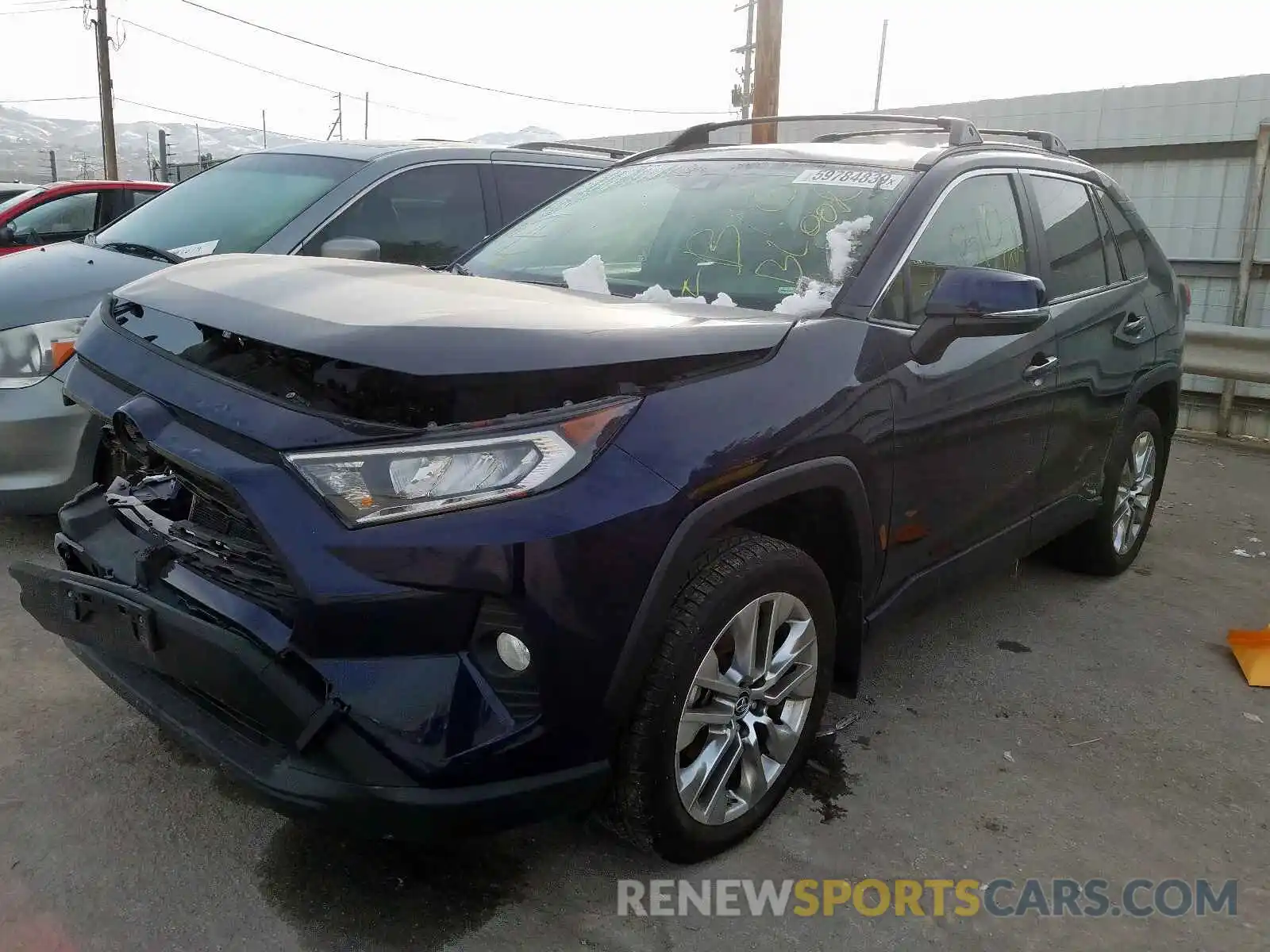 2 Photograph of a damaged car JTMA1RFV8KD507684 TOYOTA RAV4 XLE P 2019