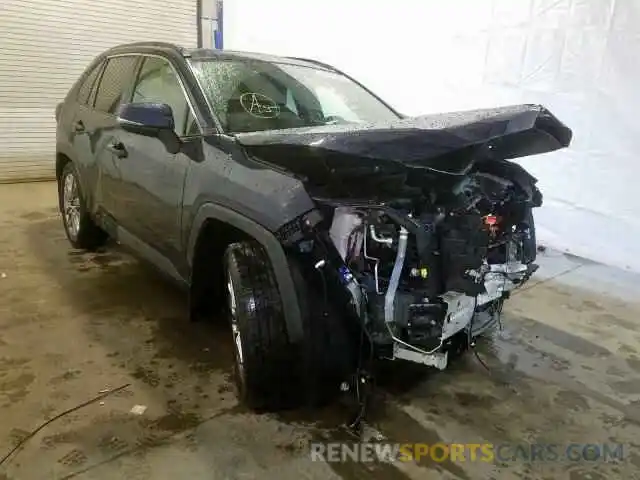 1 Photograph of a damaged car JTMA1RFVXKD023144 TOYOTA RAV4 XLE P 2019