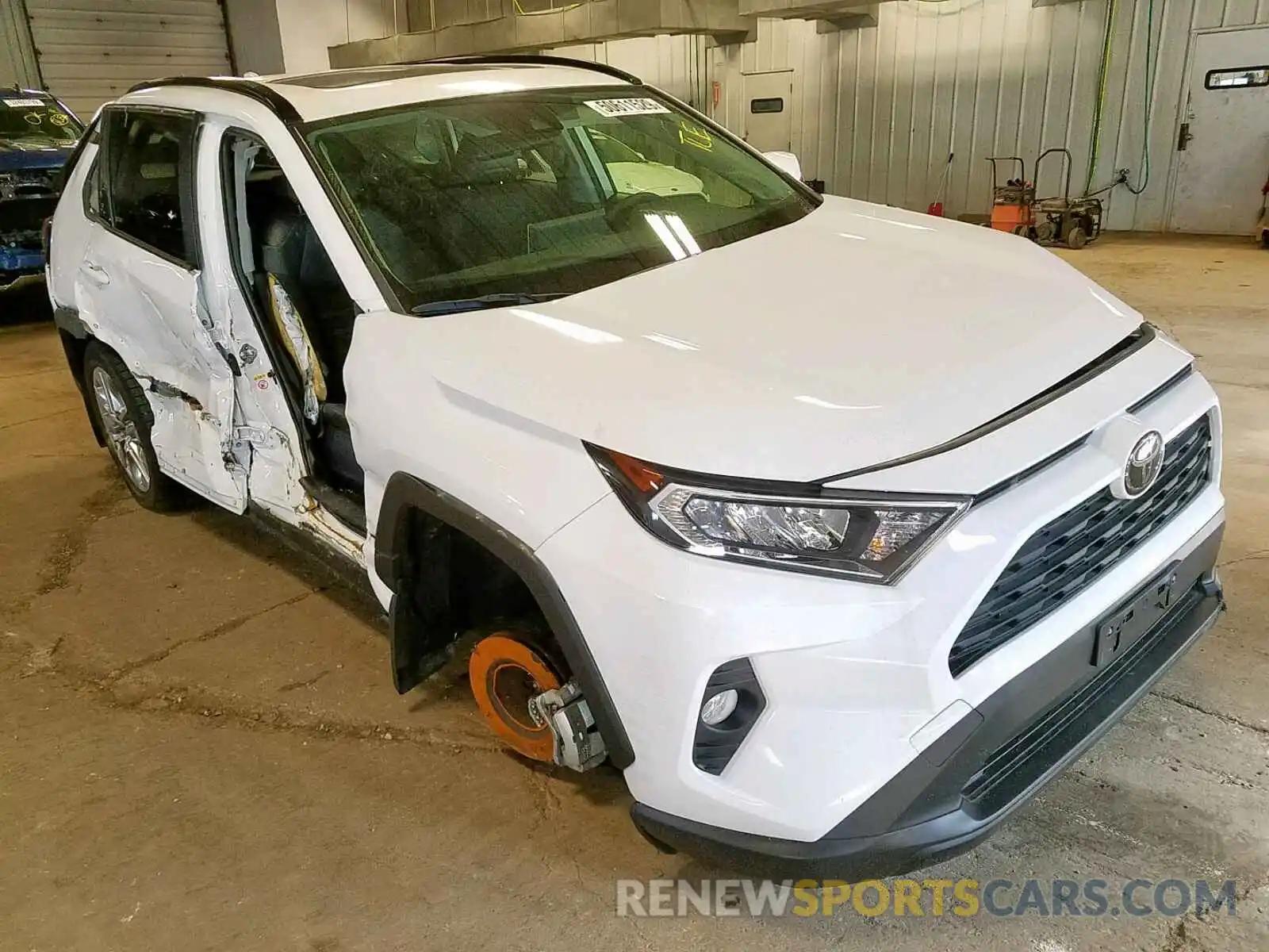 1 Photograph of a damaged car JTMA1RFVXKD511459 TOYOTA RAV4 XLE P 2019