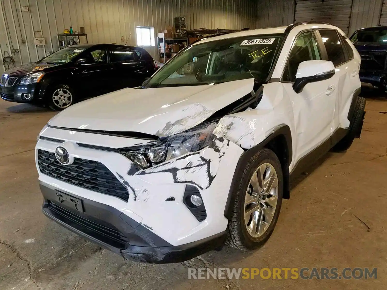 2 Photograph of a damaged car JTMA1RFVXKD511459 TOYOTA RAV4 XLE P 2019