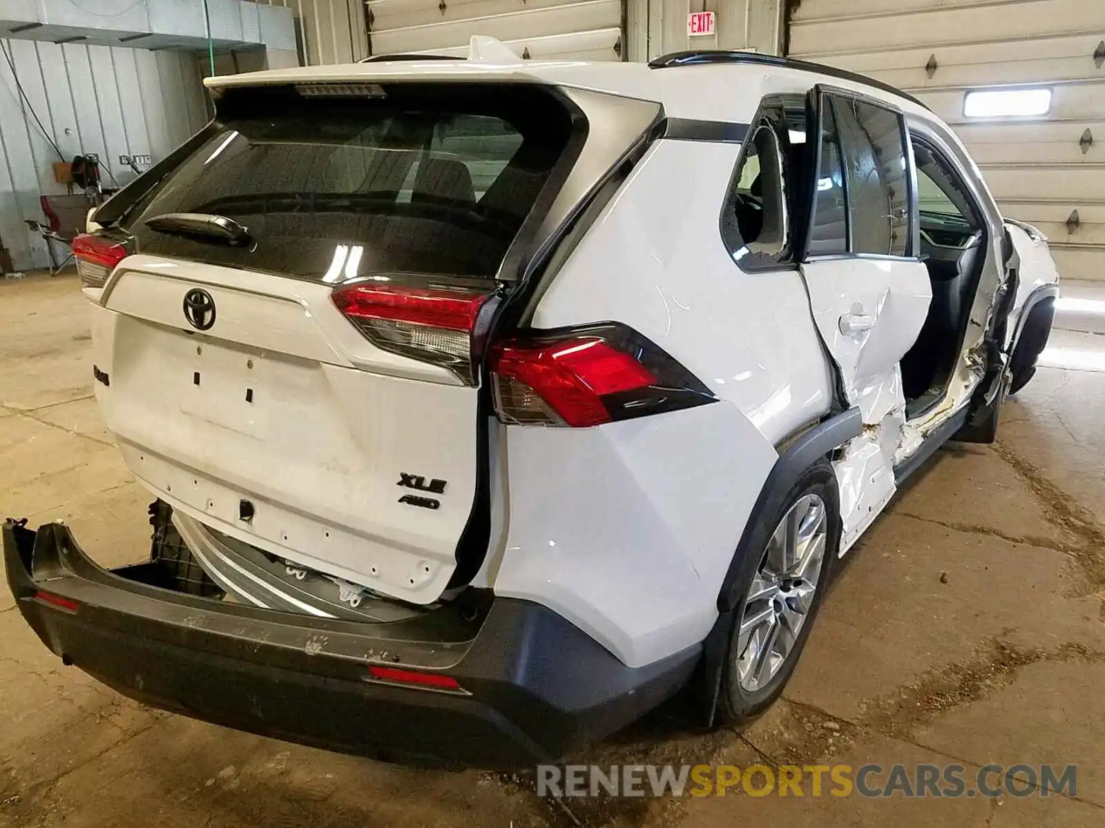 4 Photograph of a damaged car JTMA1RFVXKD511459 TOYOTA RAV4 XLE P 2019