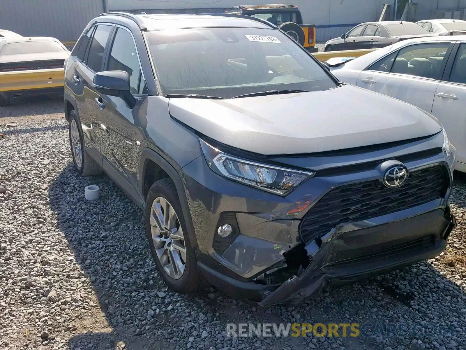 1 Photograph of a damaged car JTMC1RFV0KD014977 TOYOTA RAV4 XLE P 2019