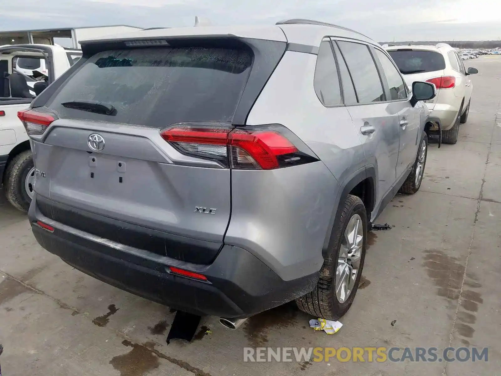 4 Photograph of a damaged car JTMC1RFV1KD014762 TOYOTA RAV4 XLE P 2019