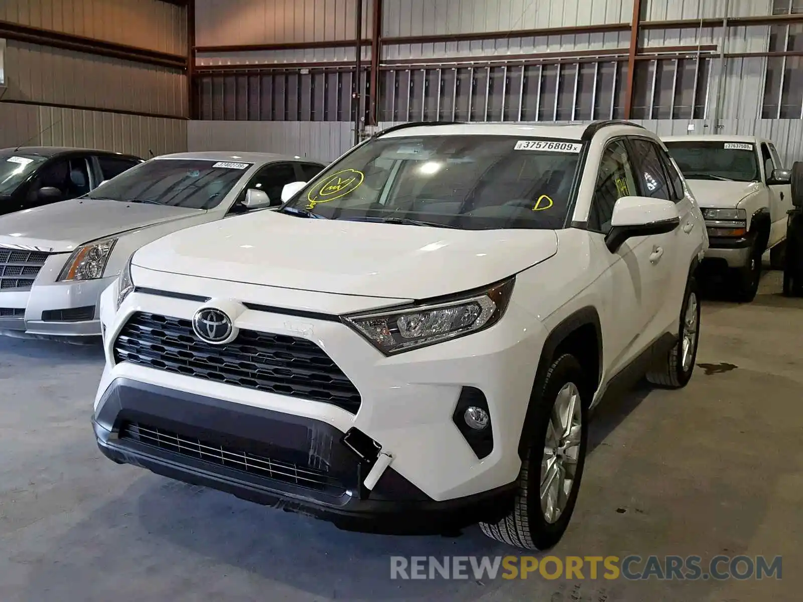 2 Photograph of a damaged car JTMC1RFV1KD021663 TOYOTA RAV4 XLE P 2019