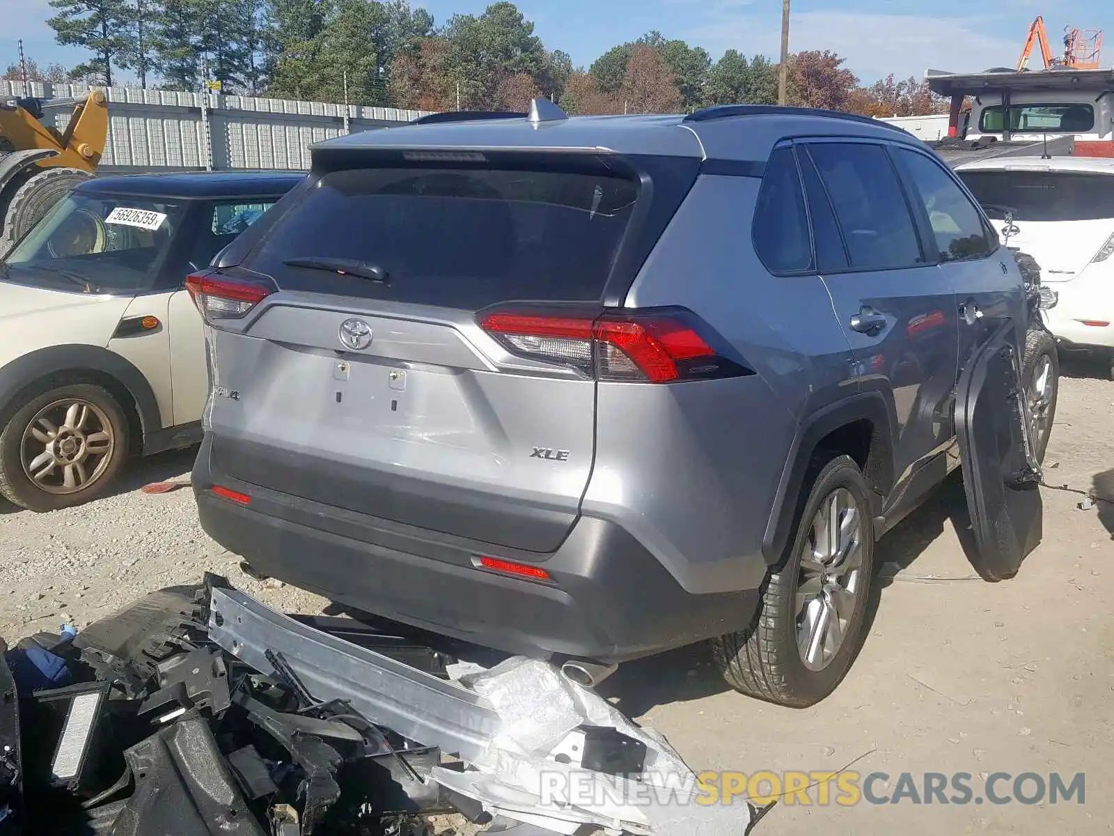 4 Photograph of a damaged car JTMC1RFV2KD028766 TOYOTA RAV4 XLE P 2019