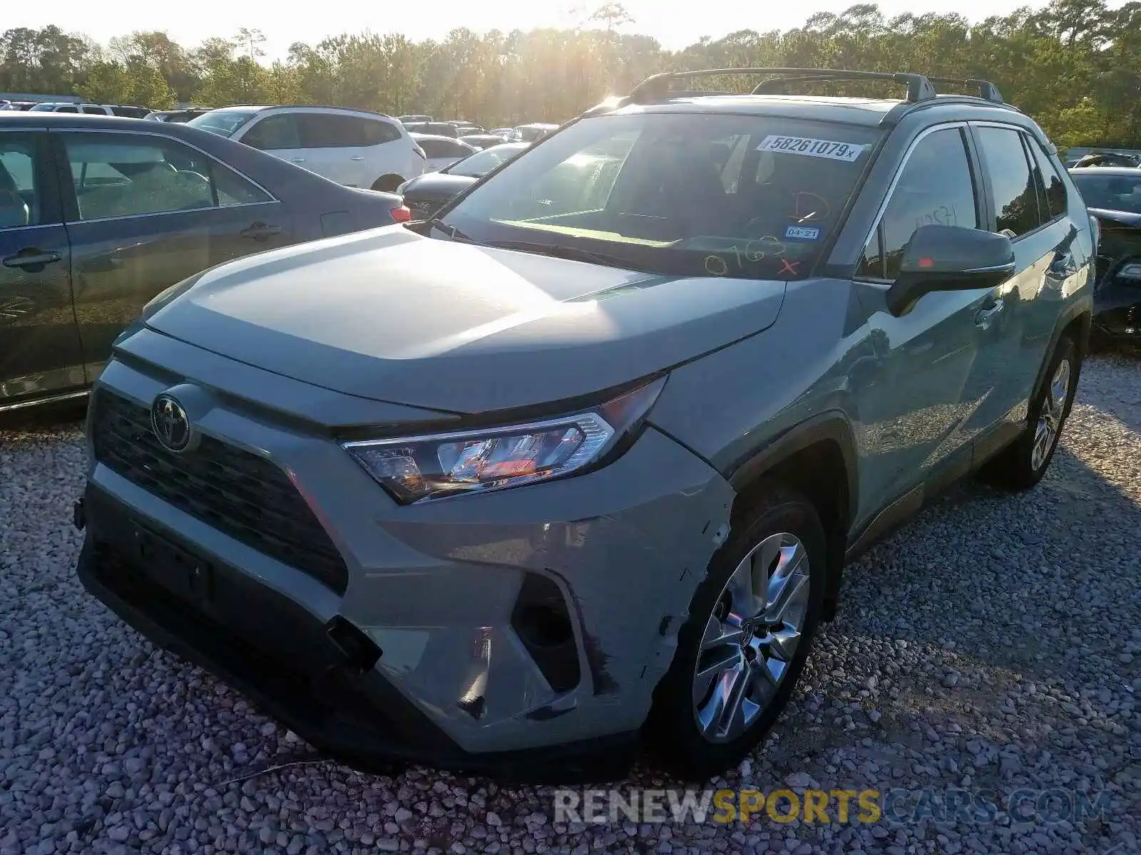 2 Photograph of a damaged car JTMC1RFV3KJ010763 TOYOTA RAV4 XLE P 2019