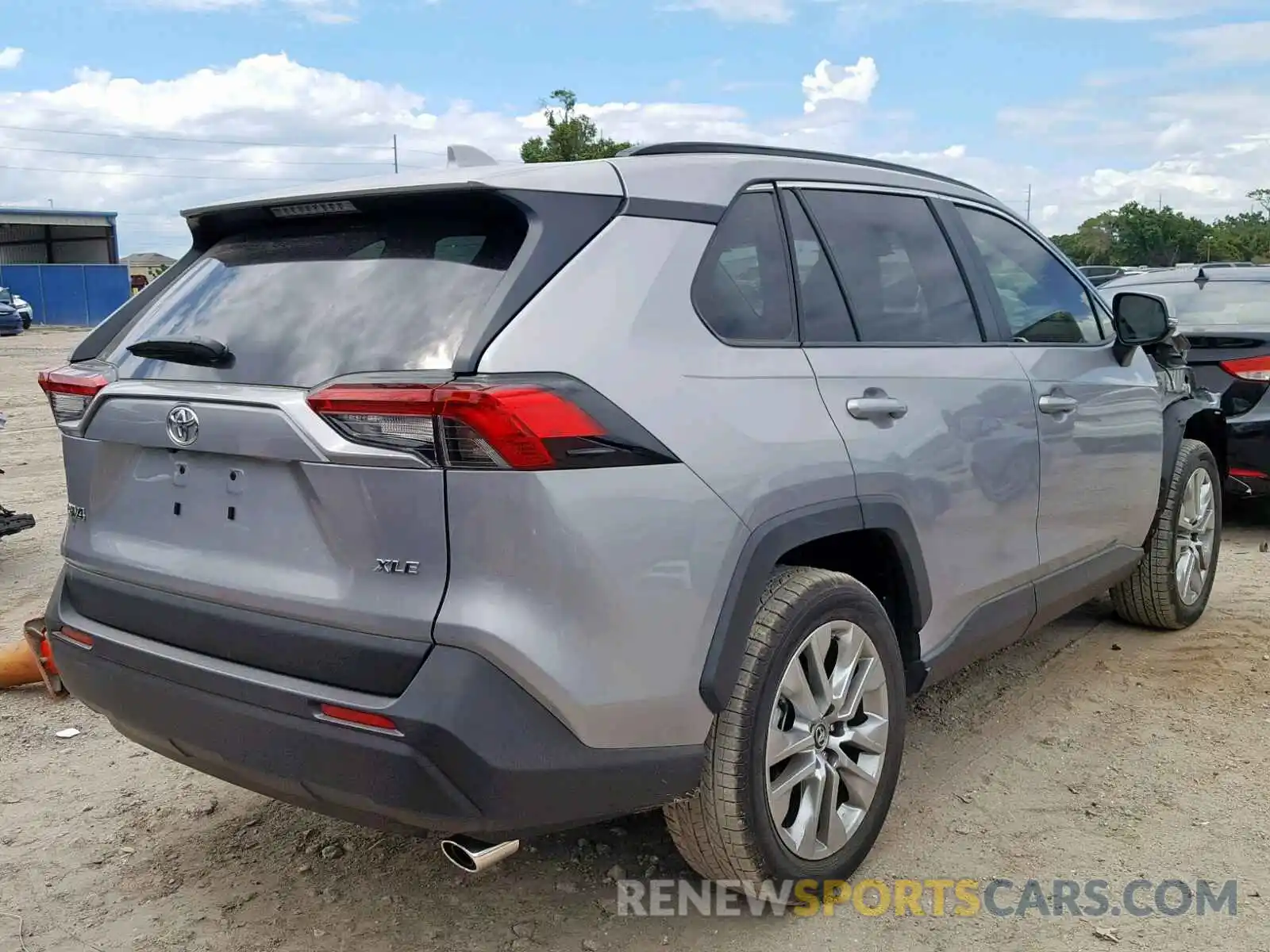 4 Photograph of a damaged car JTMC1RFV4KD019440 TOYOTA RAV4 XLE P 2019