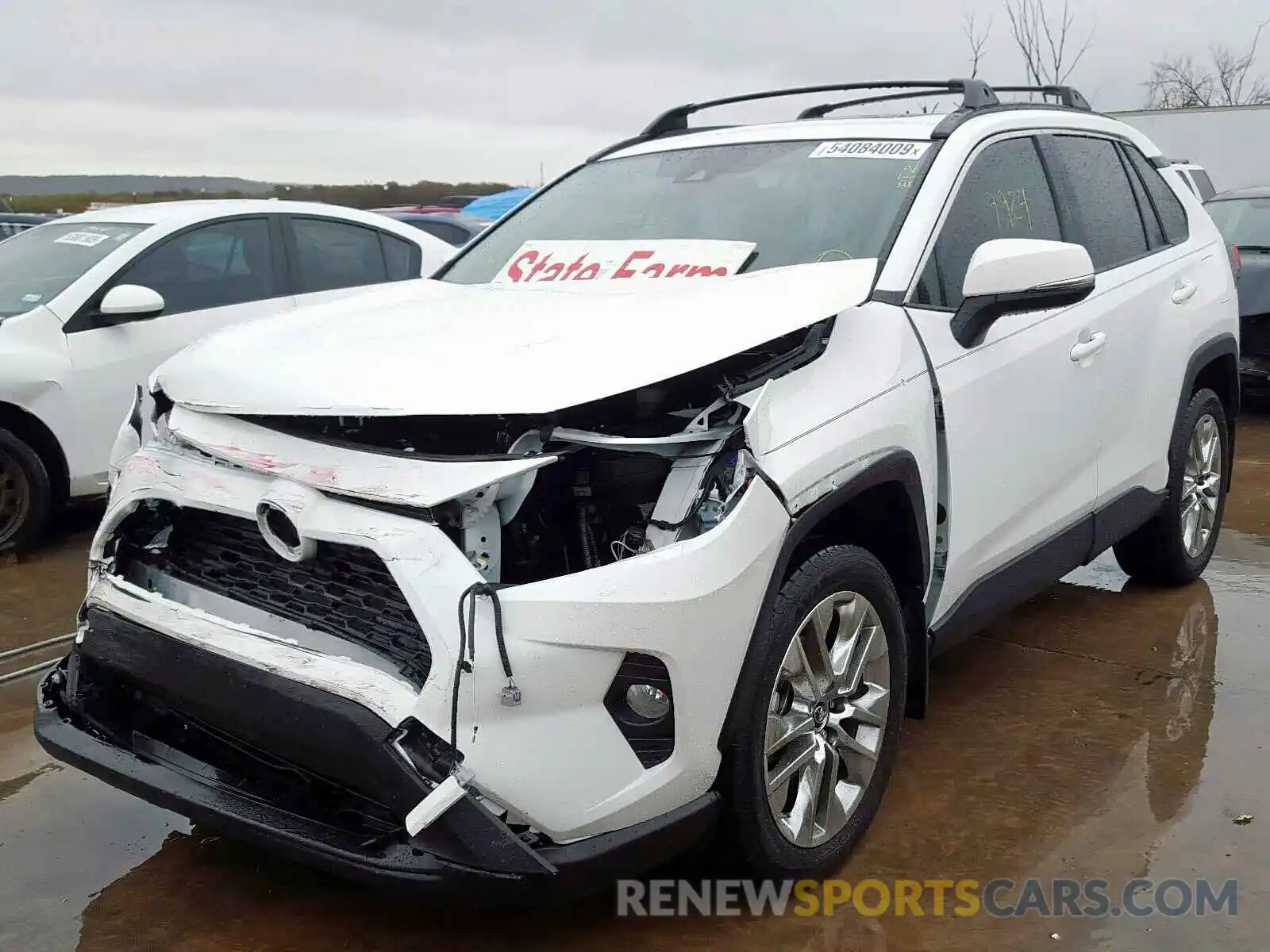 2 Photograph of a damaged car JTMC1RFV6KD010772 TOYOTA RAV4 XLE P 2019