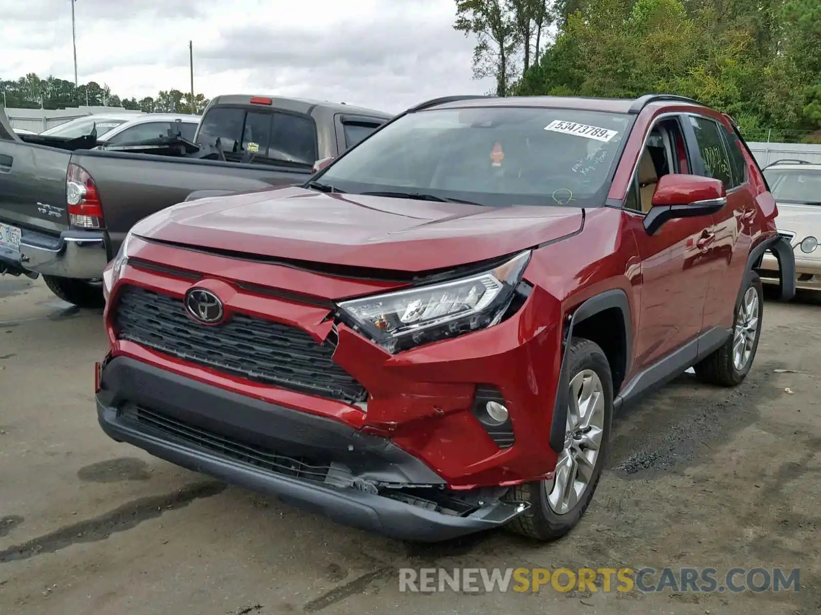 2 Photograph of a damaged car JTMC1RFV6KJ005511 TOYOTA RAV4 XLE P 2019