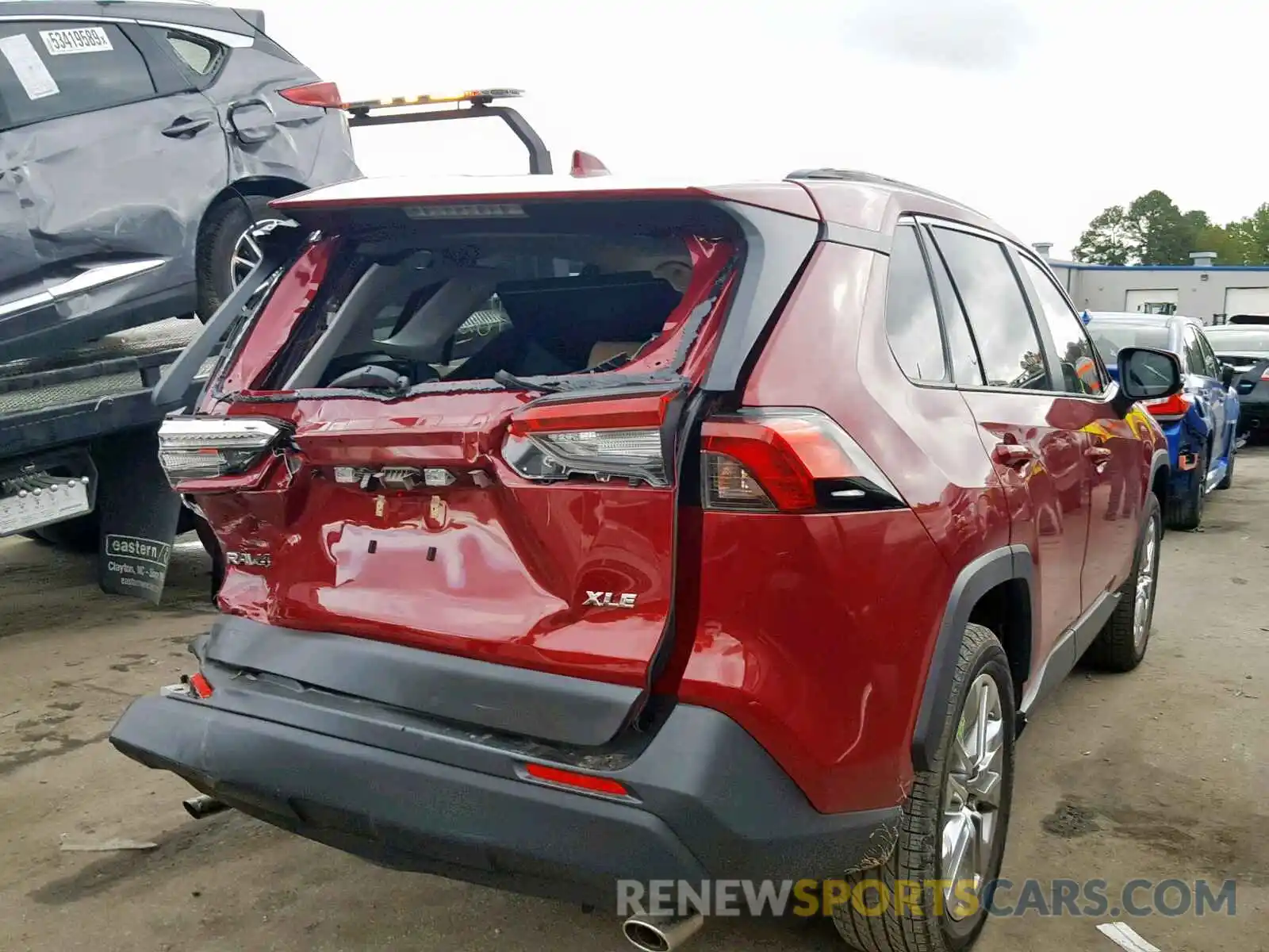 4 Photograph of a damaged car JTMC1RFV6KJ005511 TOYOTA RAV4 XLE P 2019