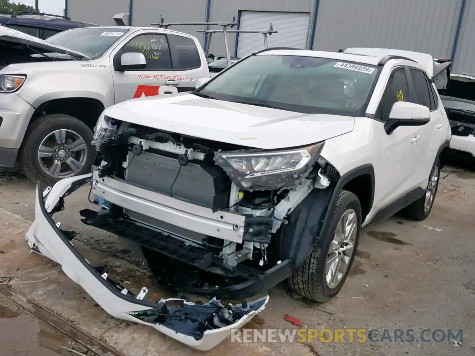 2 Photograph of a damaged car JTMC1RFV8KD010501 TOYOTA RAV4 XLE P 2019