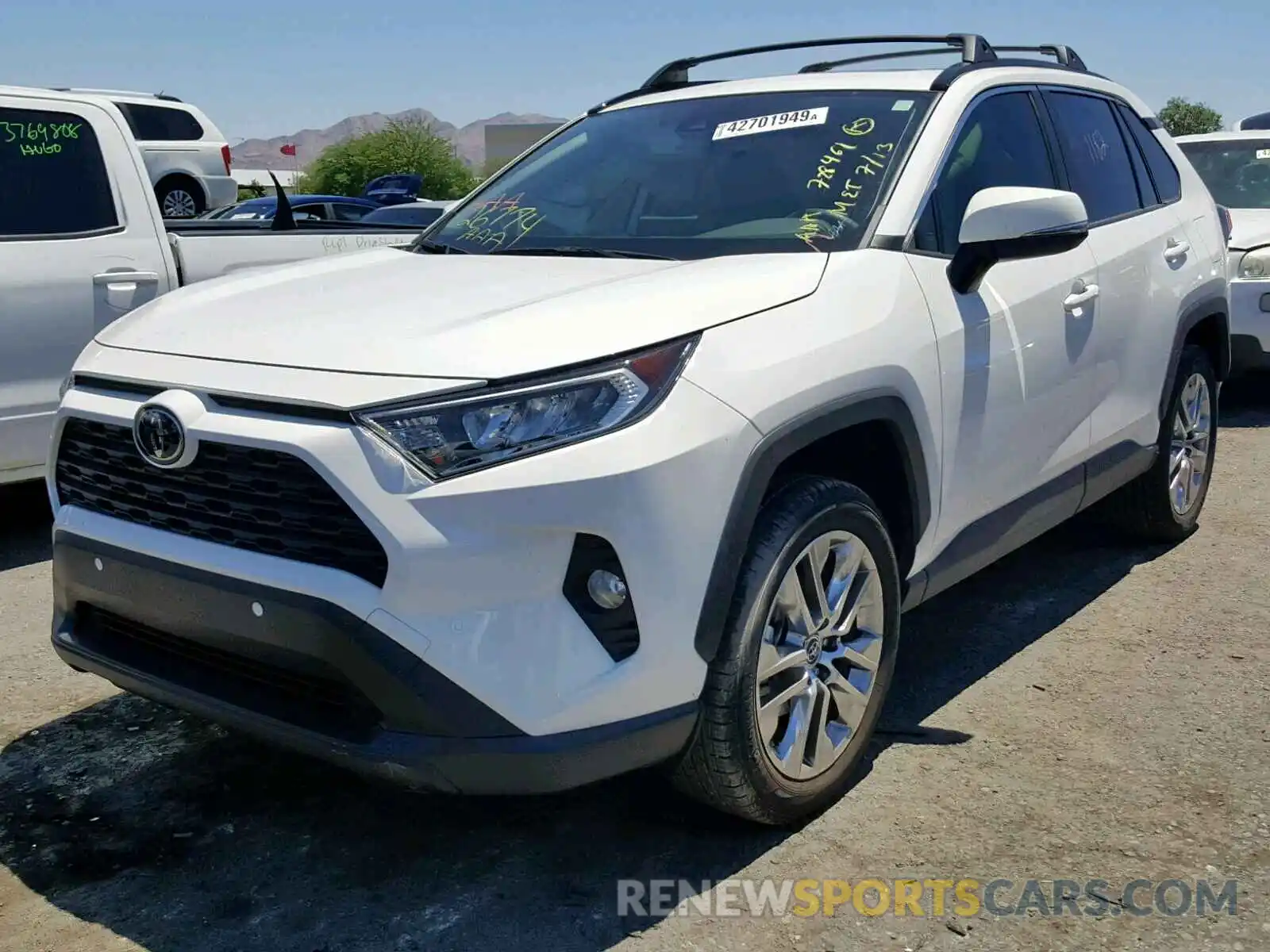 2 Фотография поврежденного автомобиля JTMC1RFVXKD013366 TOYOTA RAV4 XLE P 2019