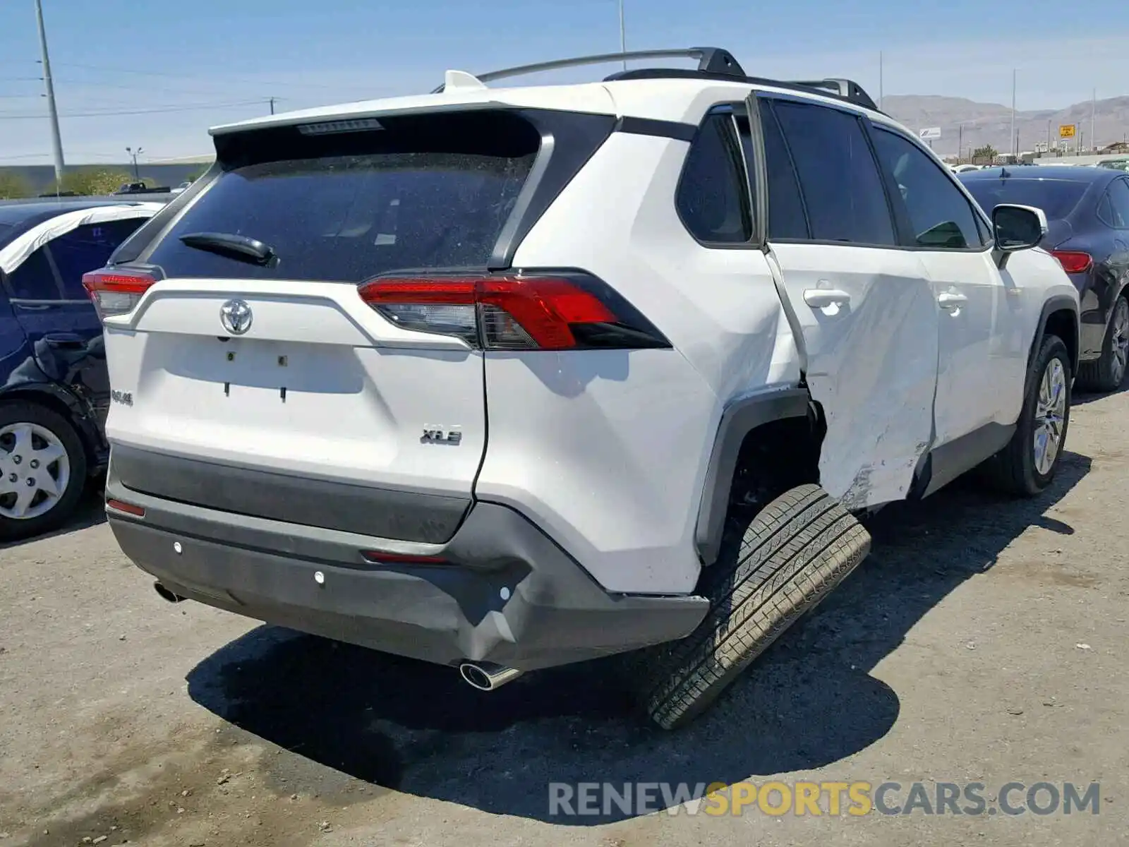 4 Фотография поврежденного автомобиля JTMC1RFVXKD013366 TOYOTA RAV4 XLE P 2019