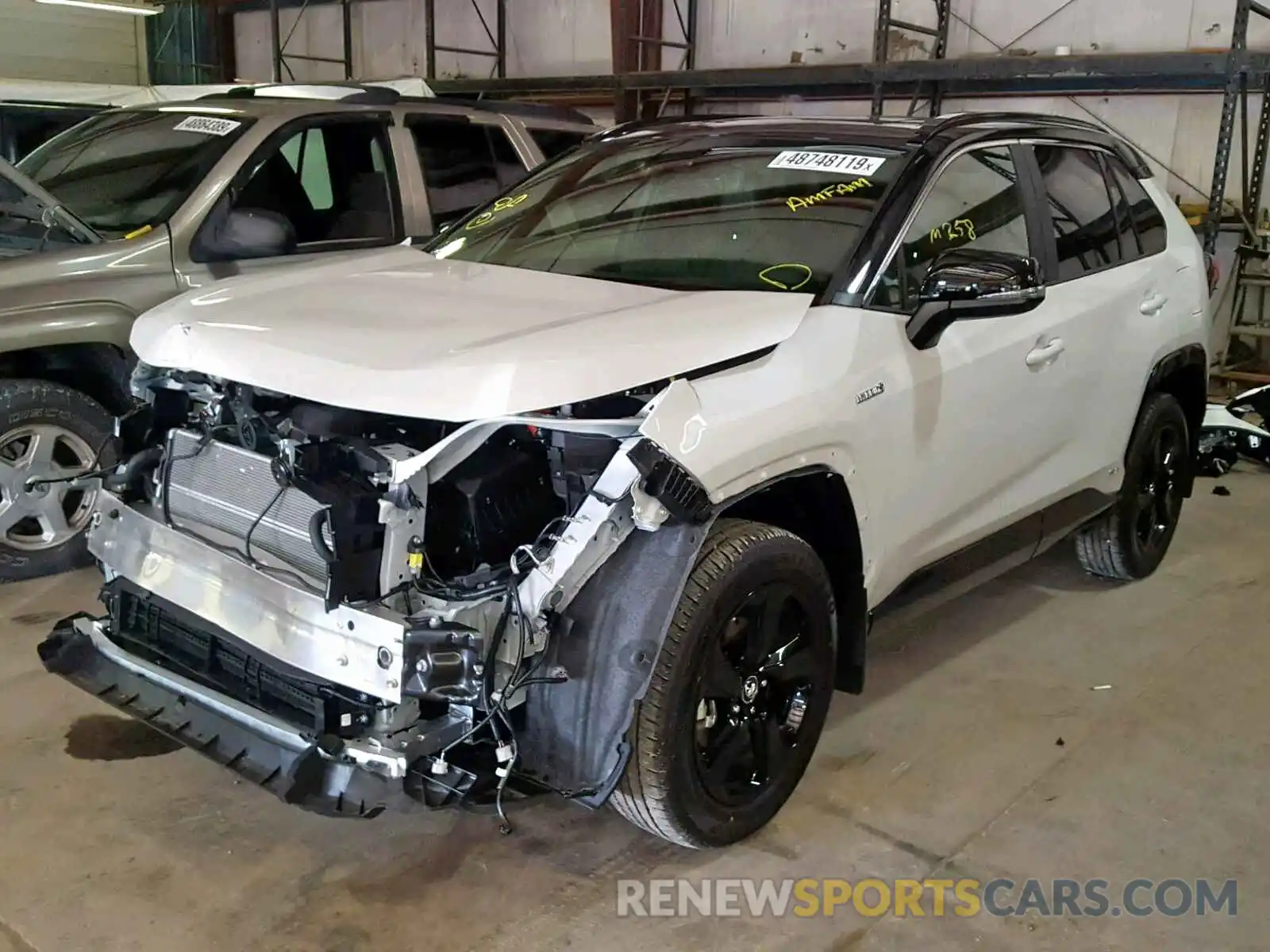 2 Photograph of a damaged car JTMEWRFV1KJ019357 TOYOTA RAV4 XSE 2019