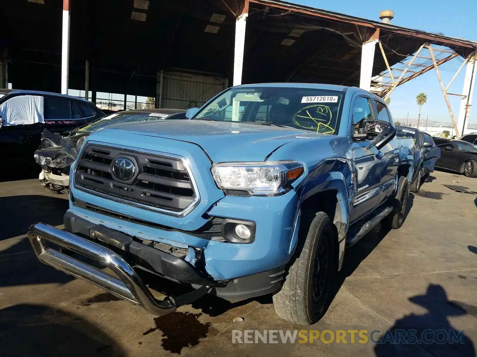 2 Photograph of a damaged car 3TMAZ5CN0KM083752 TOYOTA TACOMA 2019