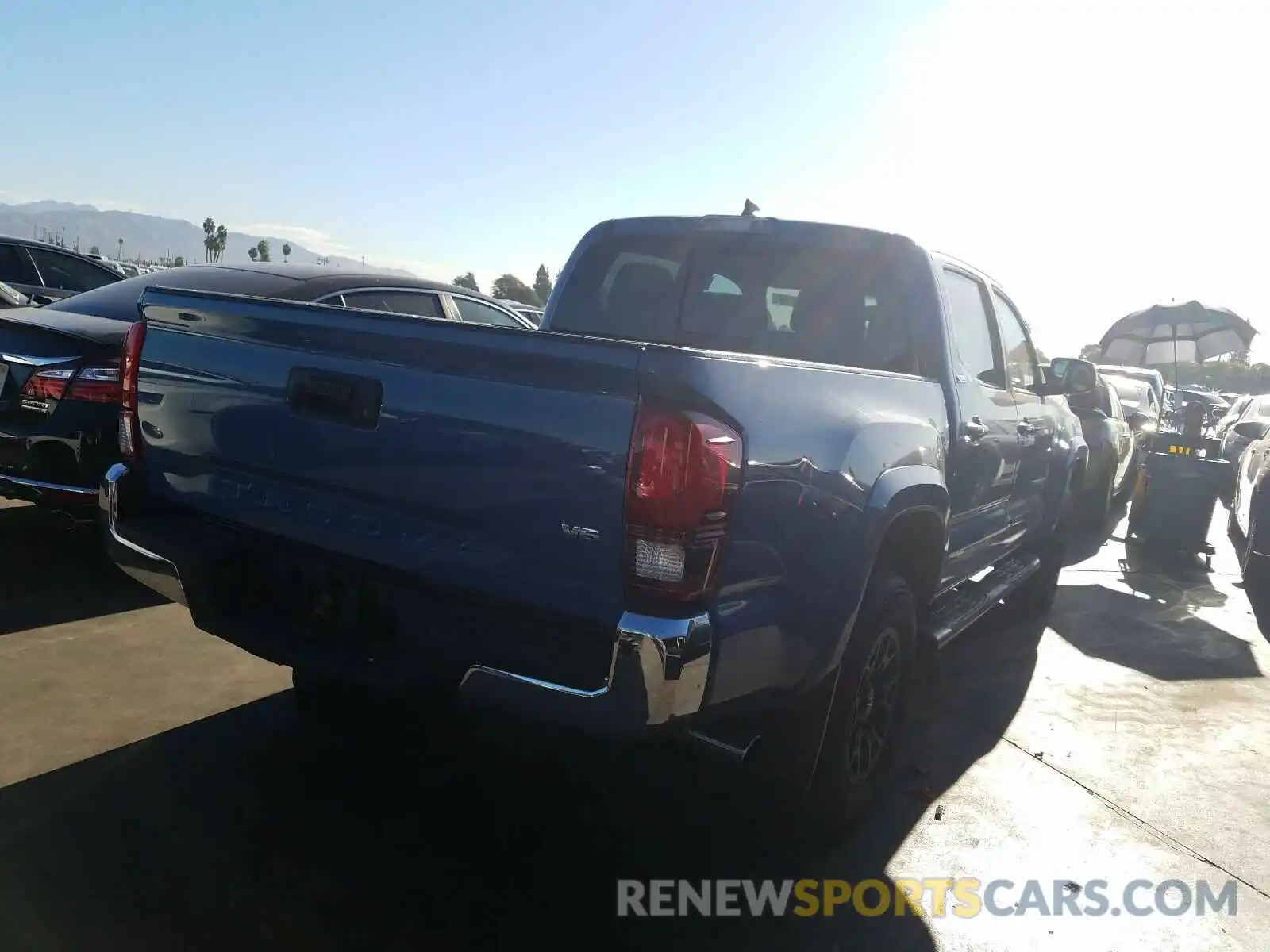 4 Photograph of a damaged car 3TMAZ5CN0KM083752 TOYOTA TACOMA 2019