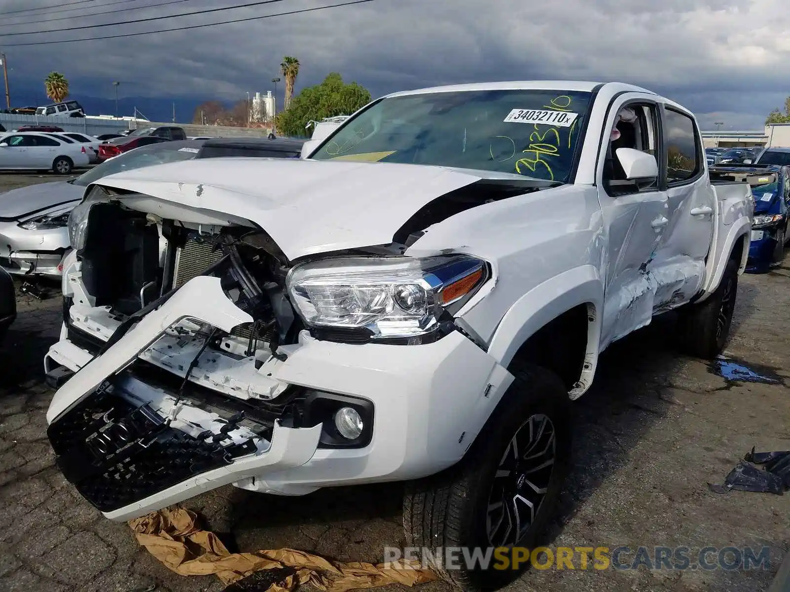 2 Photograph of a damaged car 3TMAZ5CN0KM085128 TOYOTA TACOMA 2019