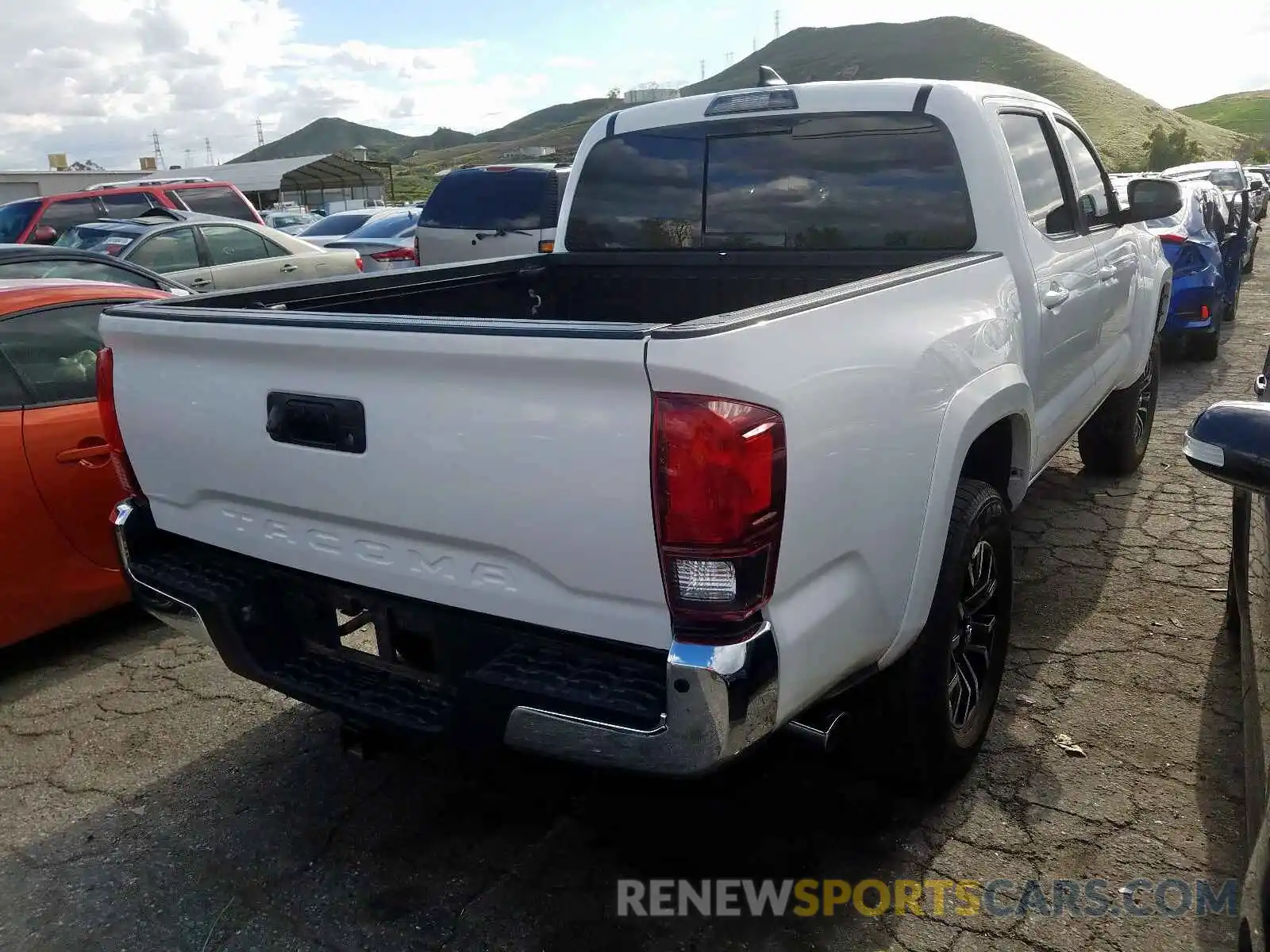 4 Photograph of a damaged car 3TMAZ5CN0KM085128 TOYOTA TACOMA 2019