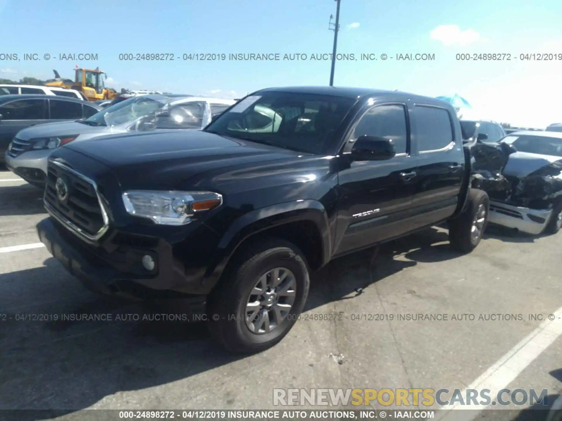 2 Photograph of a damaged car 3TMAZ5CN0KM087266 TOYOTA TACOMA 2019