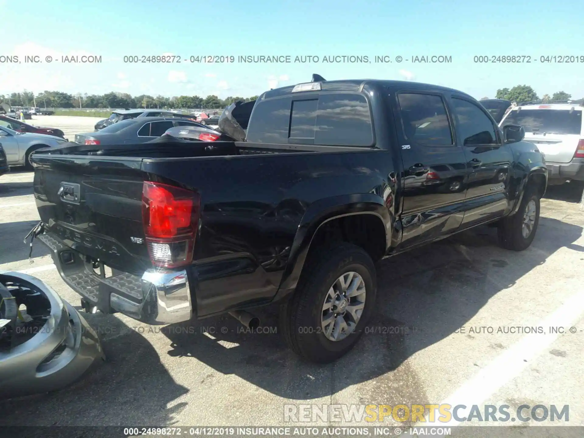 4 Photograph of a damaged car 3TMAZ5CN0KM087266 TOYOTA TACOMA 2019