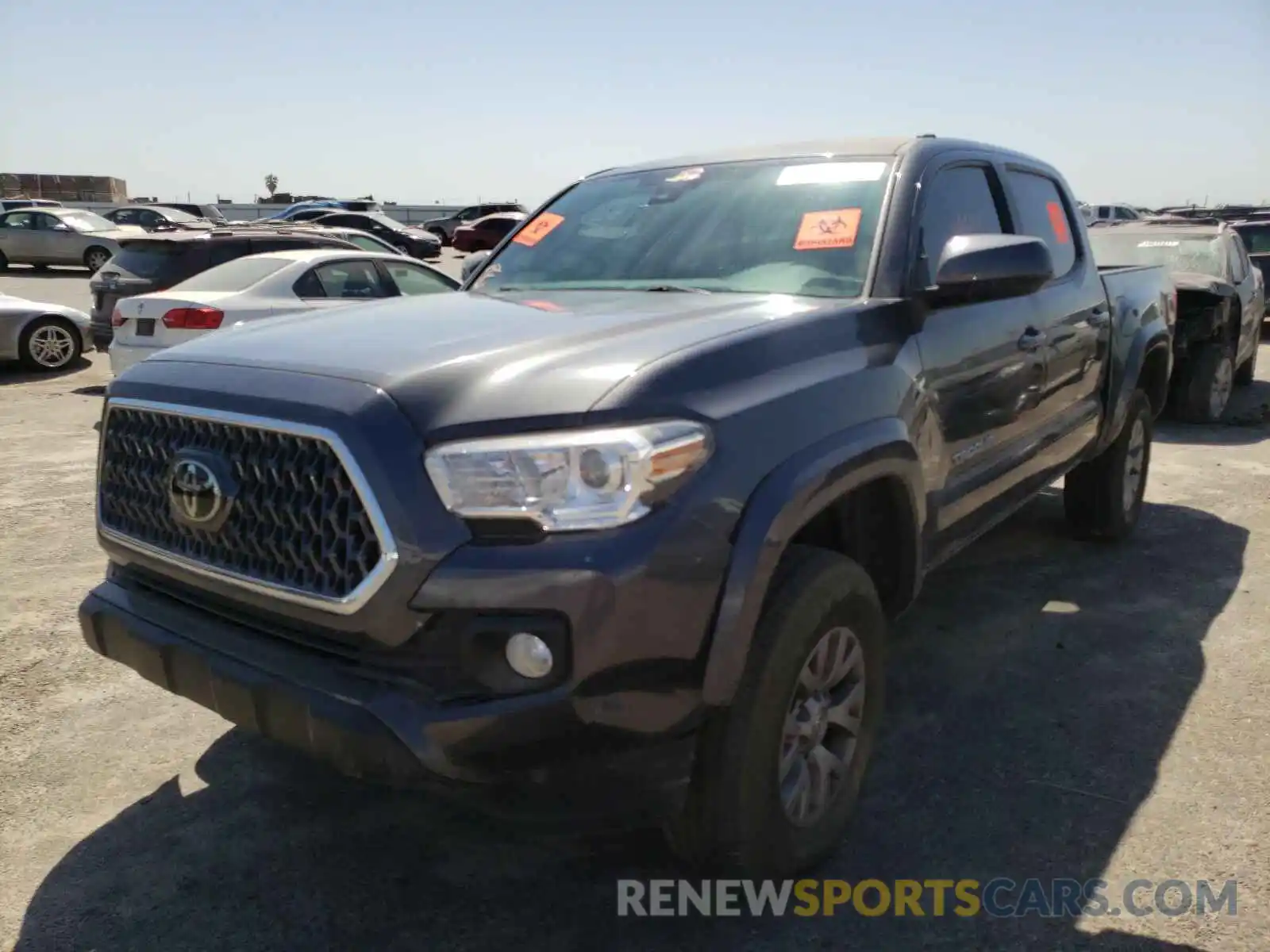 2 Photograph of a damaged car 3TMAZ5CN0KM090961 TOYOTA TACOMA 2019