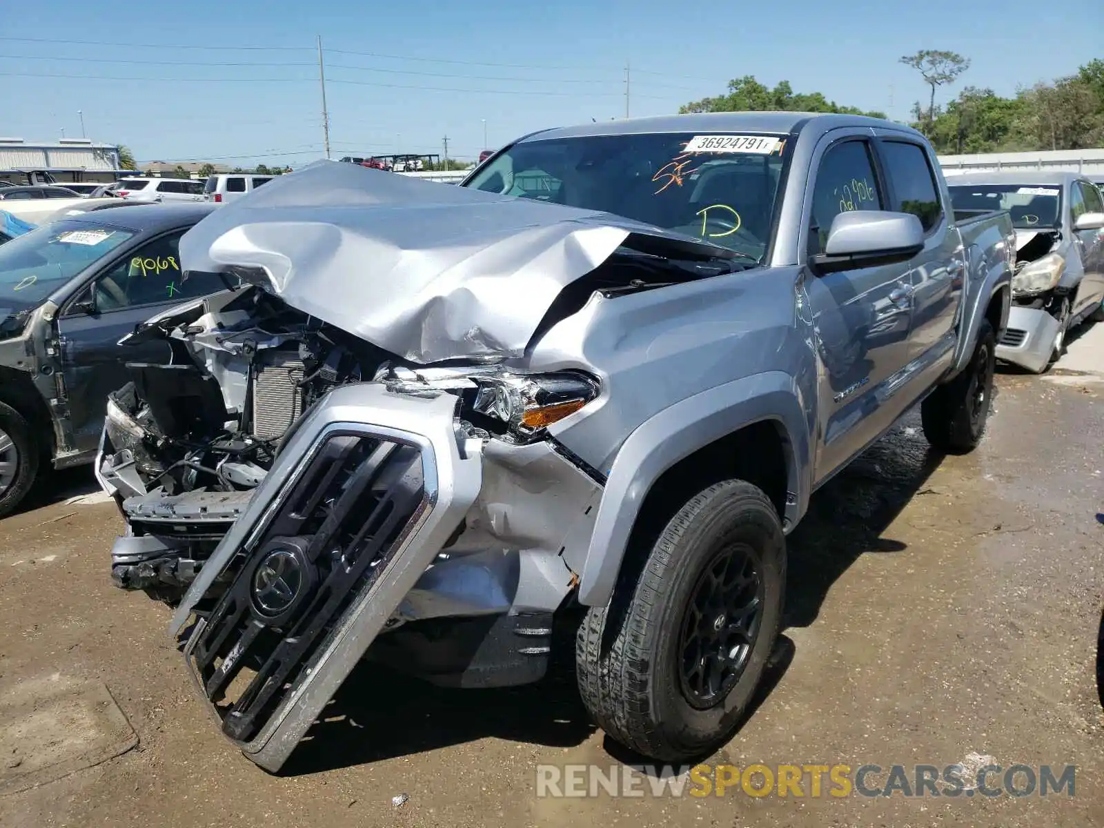 2 Photograph of a damaged car 3TMAZ5CN0KM093634 TOYOTA TACOMA 2019