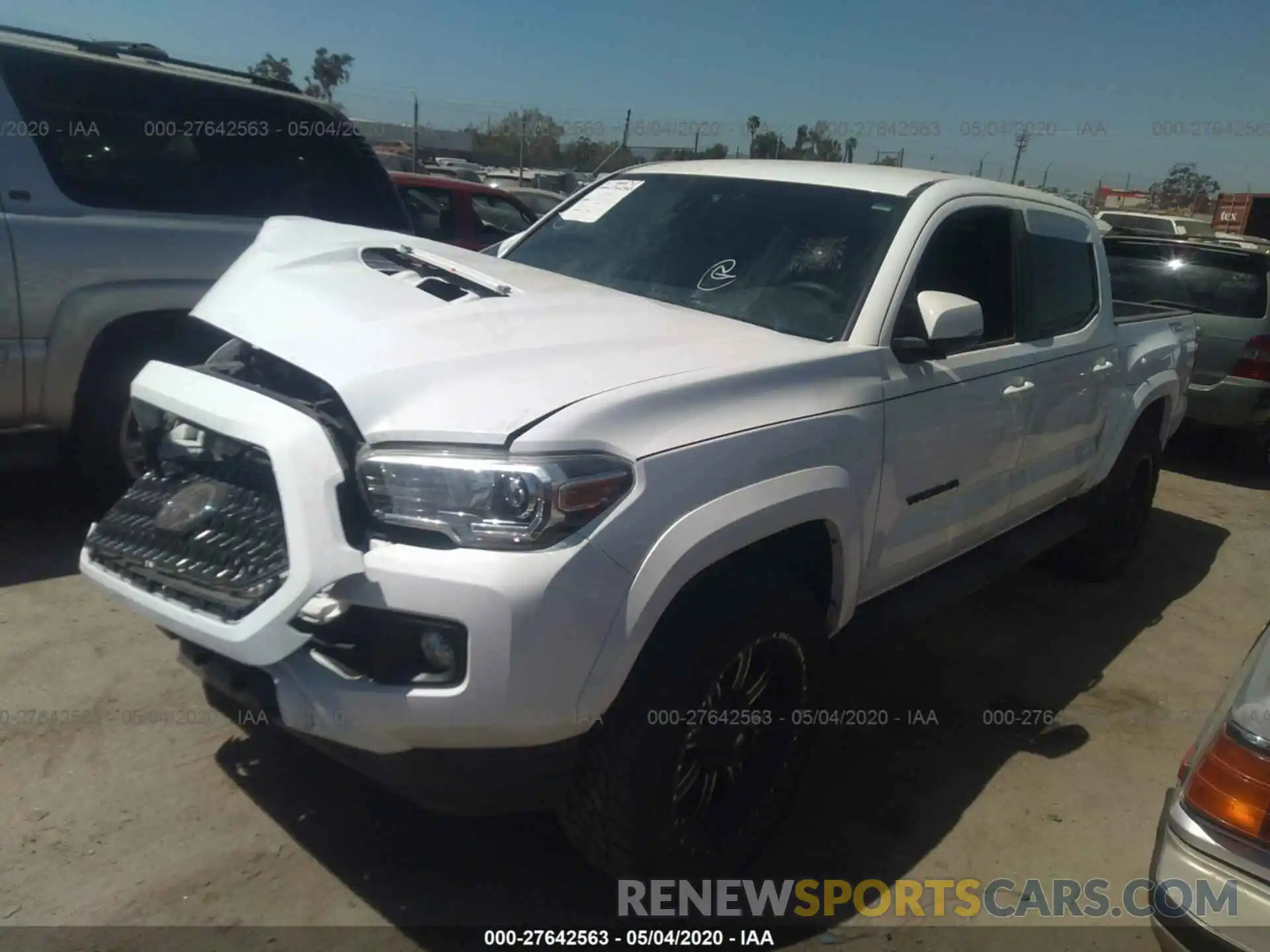 2 Photograph of a damaged car 3TMAZ5CN0KM093729 TOYOTA TACOMA 2019