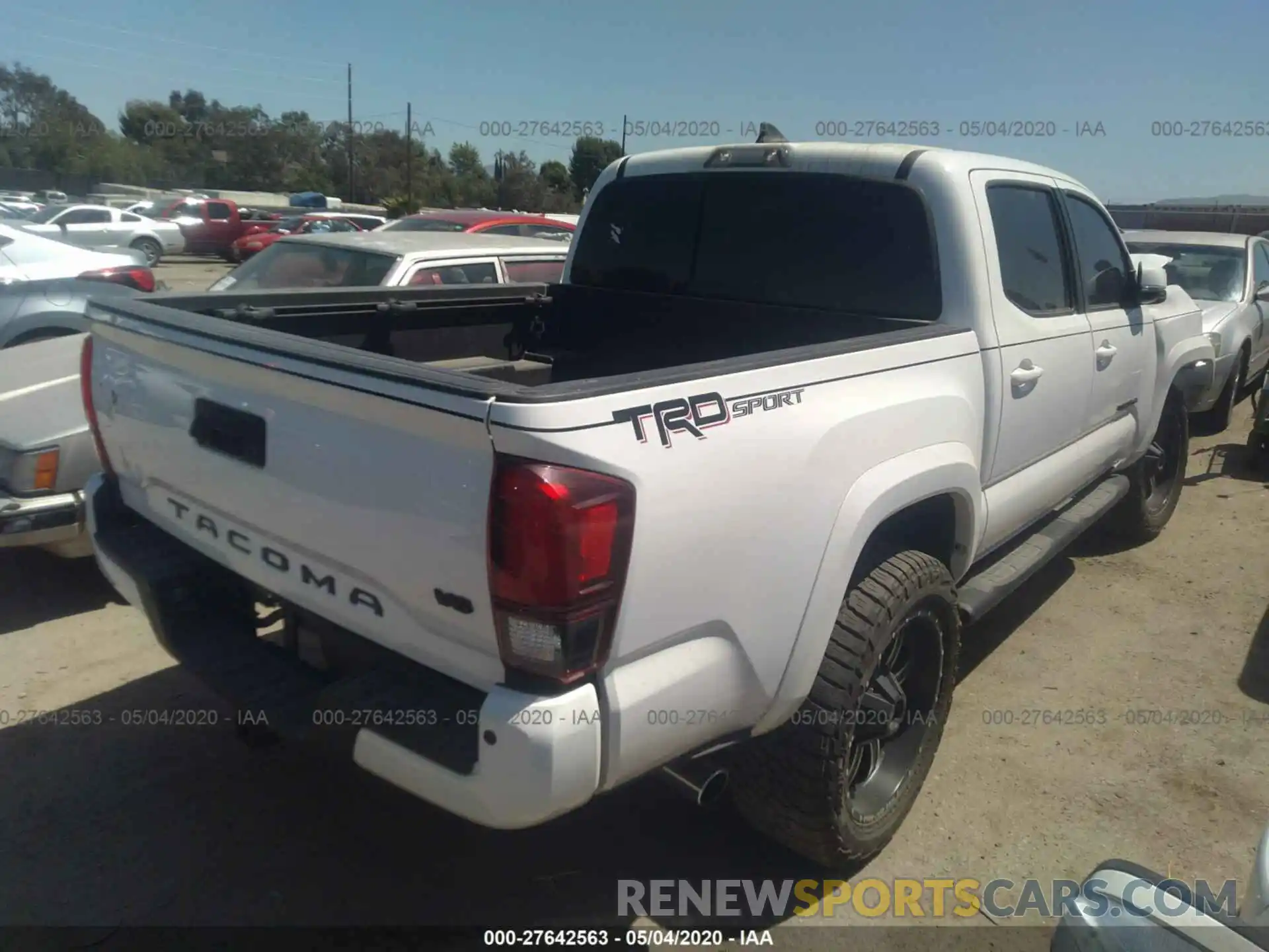 4 Photograph of a damaged car 3TMAZ5CN0KM093729 TOYOTA TACOMA 2019