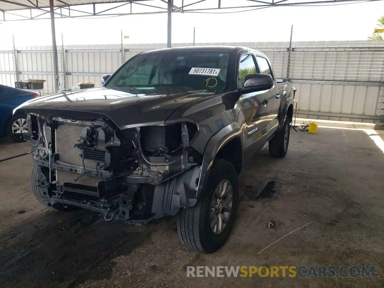 2 Photograph of a damaged car 3TMAZ5CN0KM096453 TOYOTA TACOMA 2019