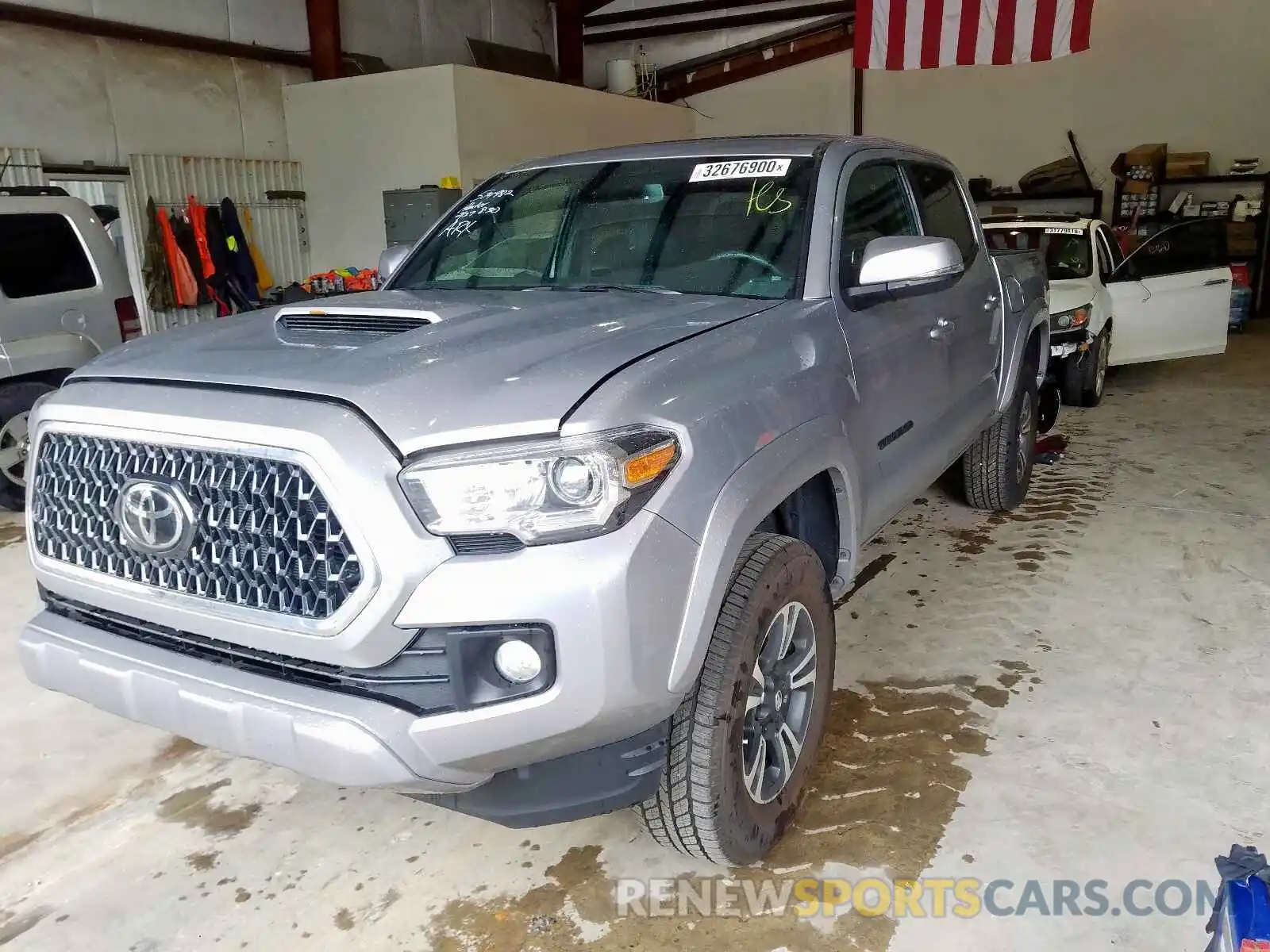 2 Photograph of a damaged car 3TMAZ5CN0KM097800 TOYOTA TACOMA 2019