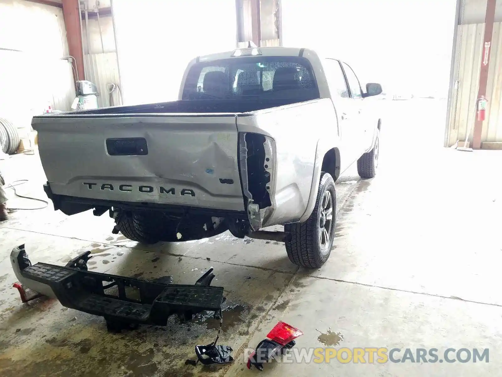 4 Photograph of a damaged car 3TMAZ5CN0KM097800 TOYOTA TACOMA 2019