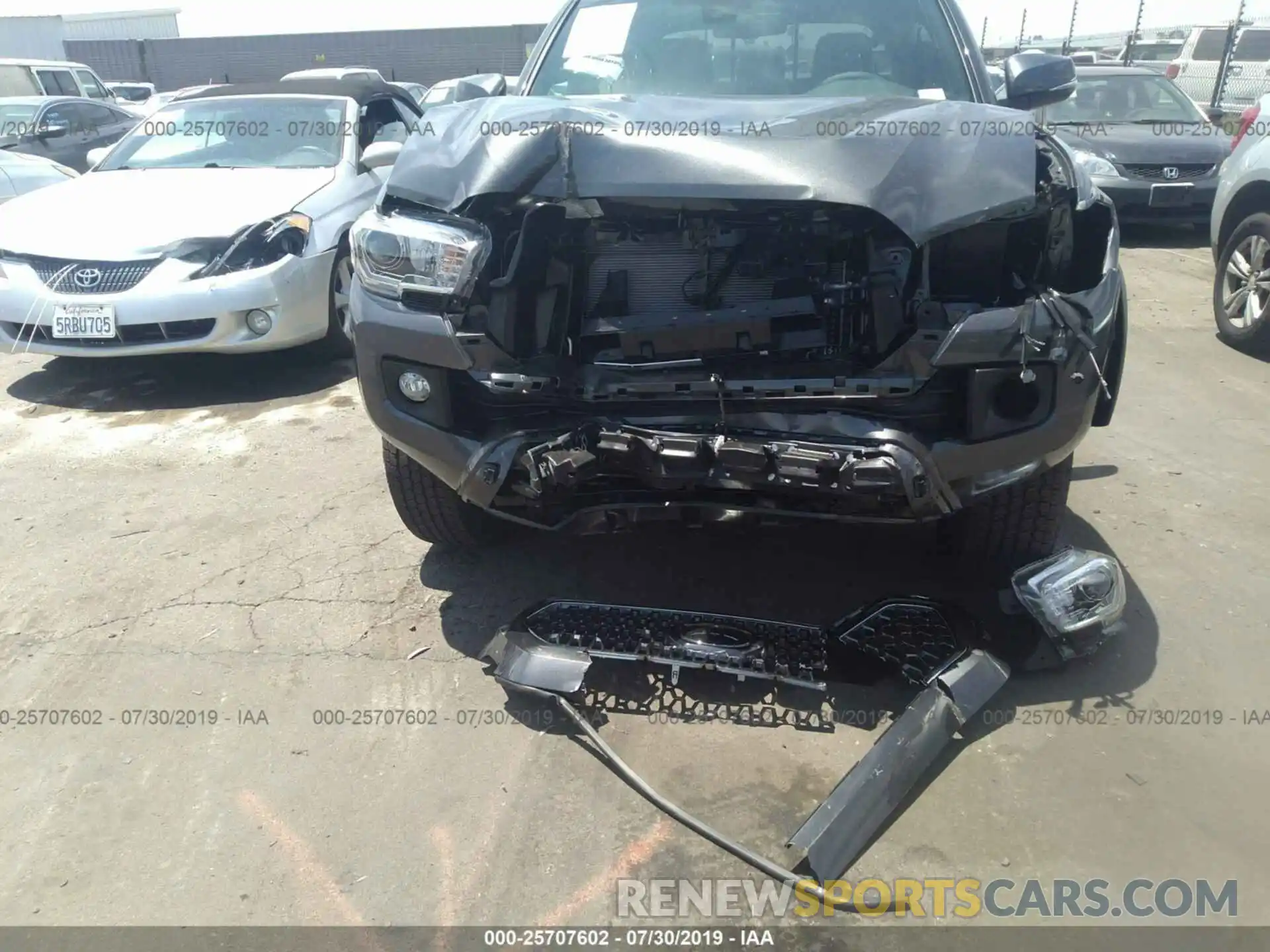 6 Photograph of a damaged car 3TMAZ5CN0KM098994 TOYOTA TACOMA 2019