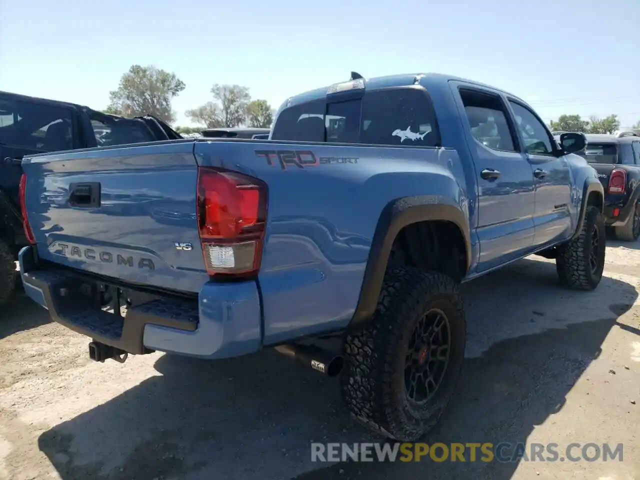 4 Photograph of a damaged car 3TMAZ5CN0KM100159 TOYOTA TACOMA 2019