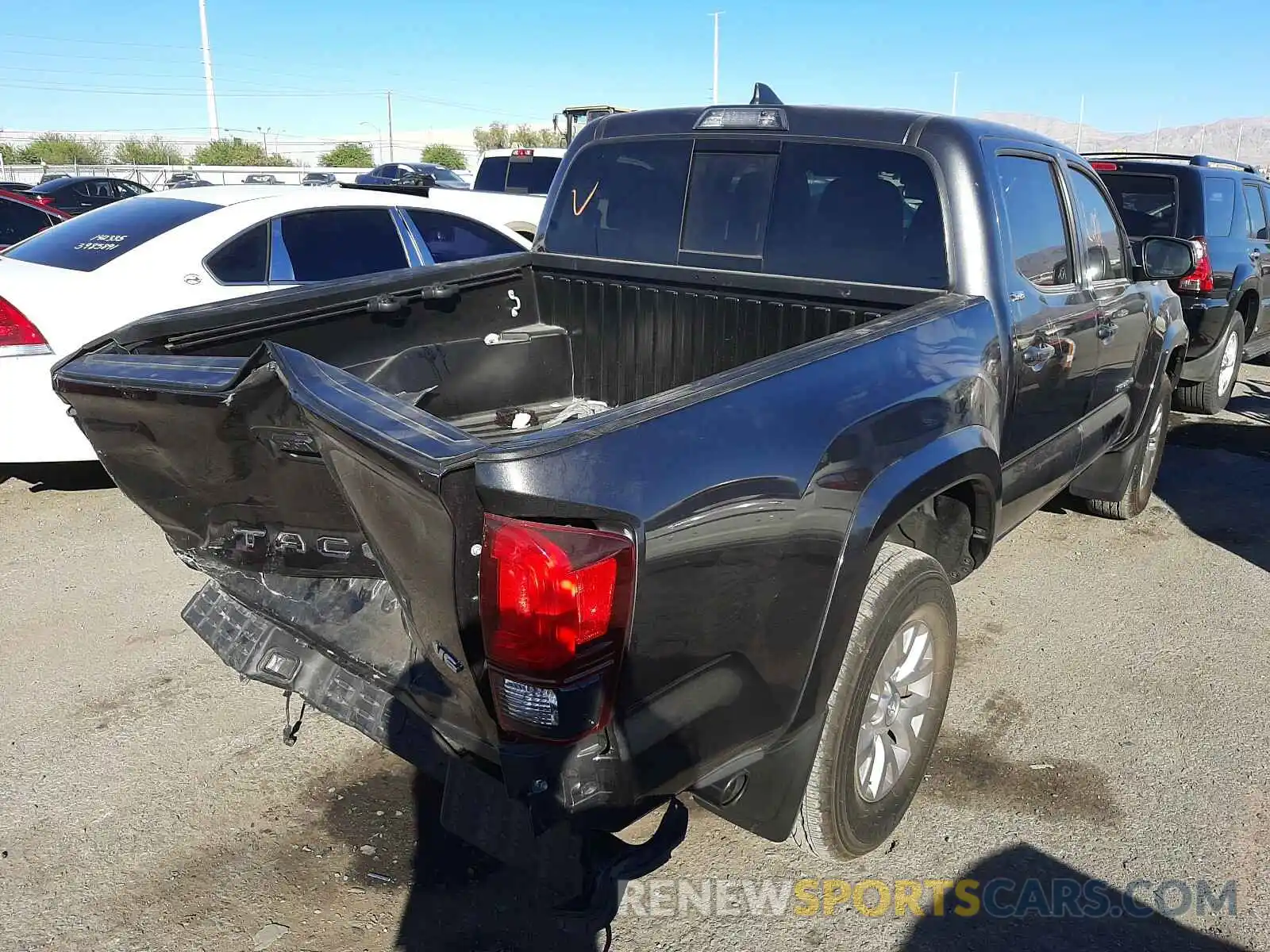 4 Photograph of a damaged car 3TMAZ5CN0KM103904 TOYOTA TACOMA 2019