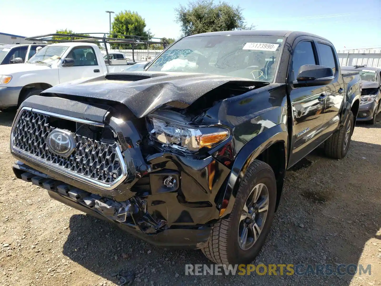 2 Photograph of a damaged car 3TMAZ5CN0KM108486 TOYOTA TACOMA 2019