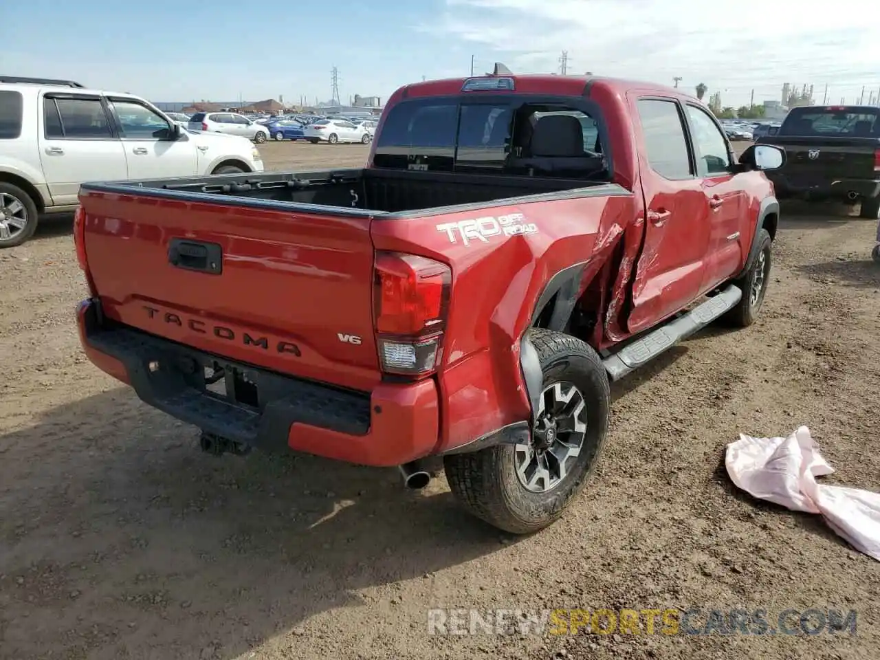 4 Photograph of a damaged car 3TMAZ5CN0KM110187 TOYOTA TACOMA 2019