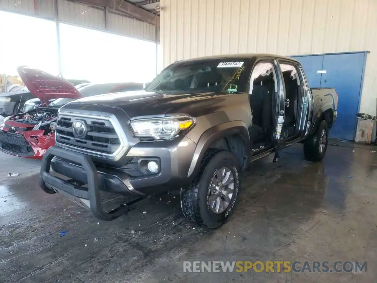 2 Photograph of a damaged car 3TMAZ5CN0KM111078 TOYOTA TACOMA 2019