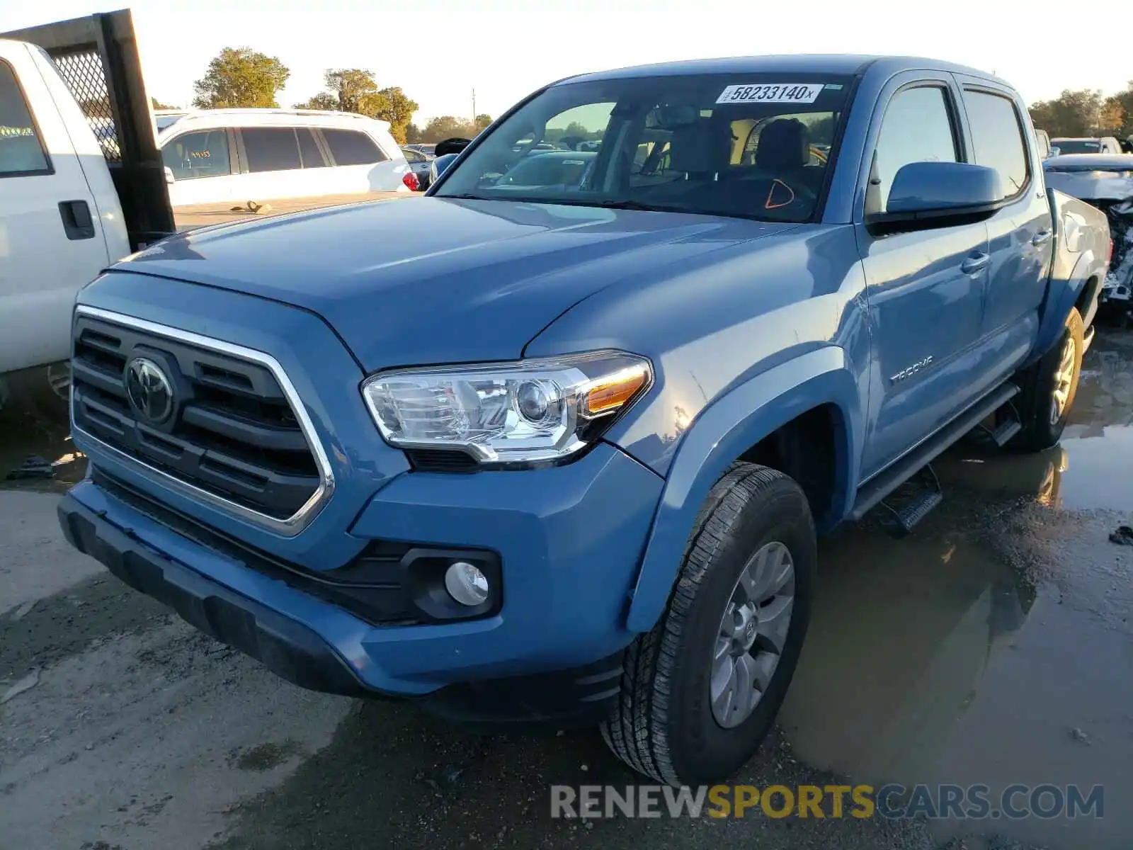 2 Photograph of a damaged car 3TMAZ5CN0KM111114 TOYOTA TACOMA 2019