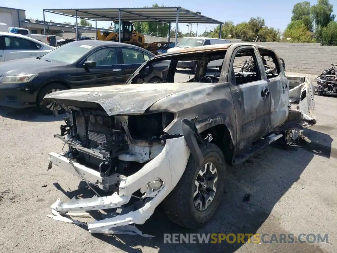 2 Photograph of a damaged car 3TMAZ5CN0KM112344 TOYOTA TACOMA 2019