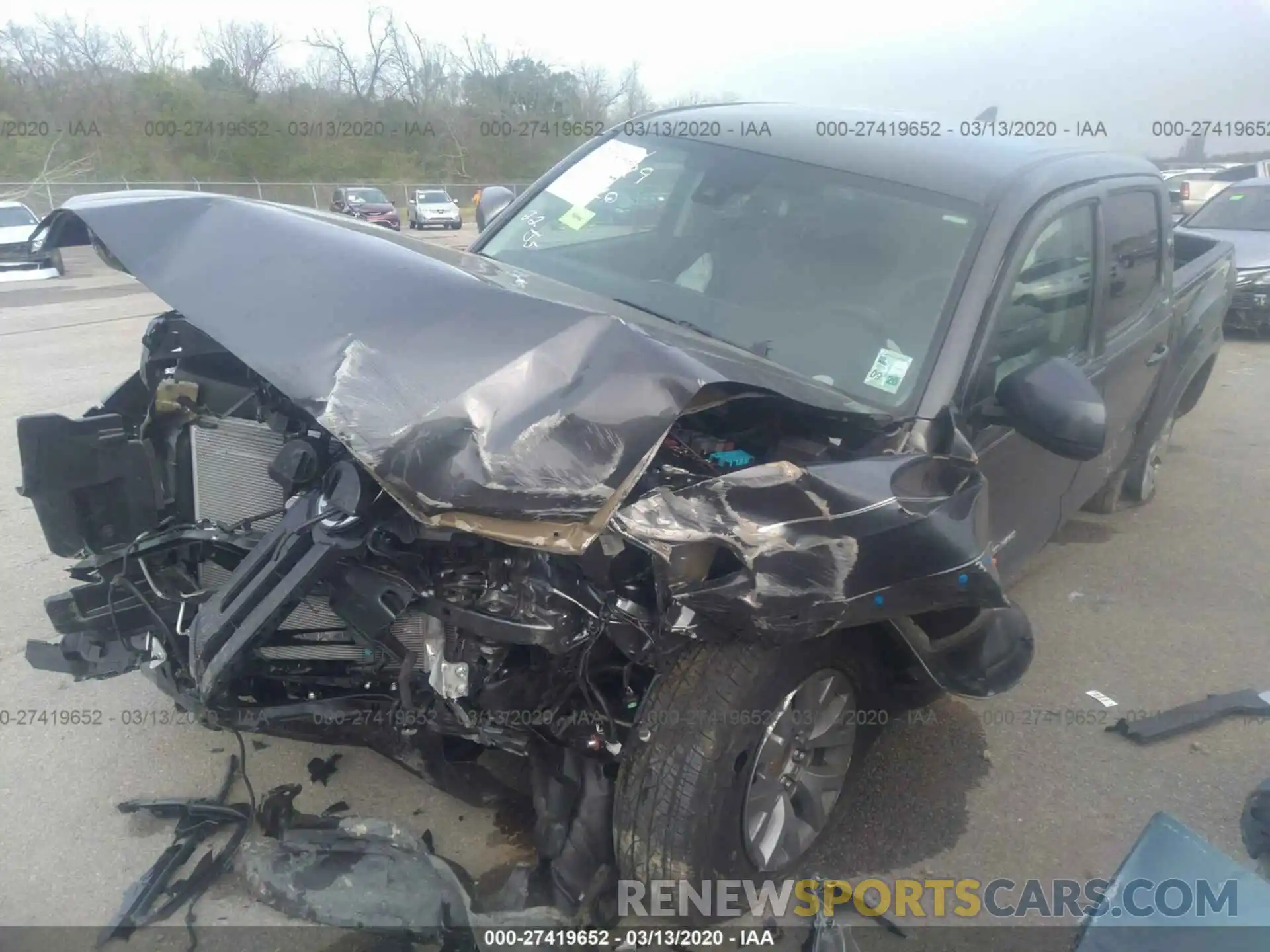 2 Photograph of a damaged car 3TMAZ5CN0KM113199 TOYOTA TACOMA 2019