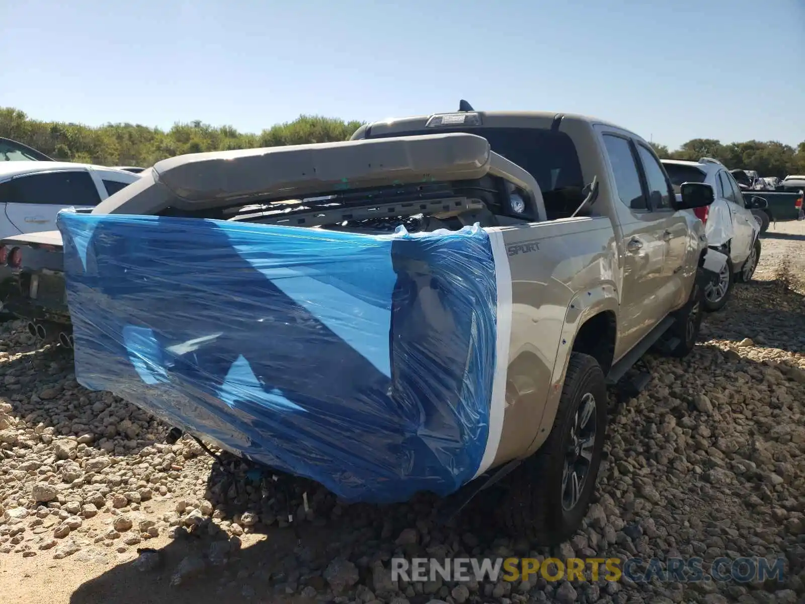 4 Photograph of a damaged car 3TMAZ5CN1KM078981 TOYOTA TACOMA 2019