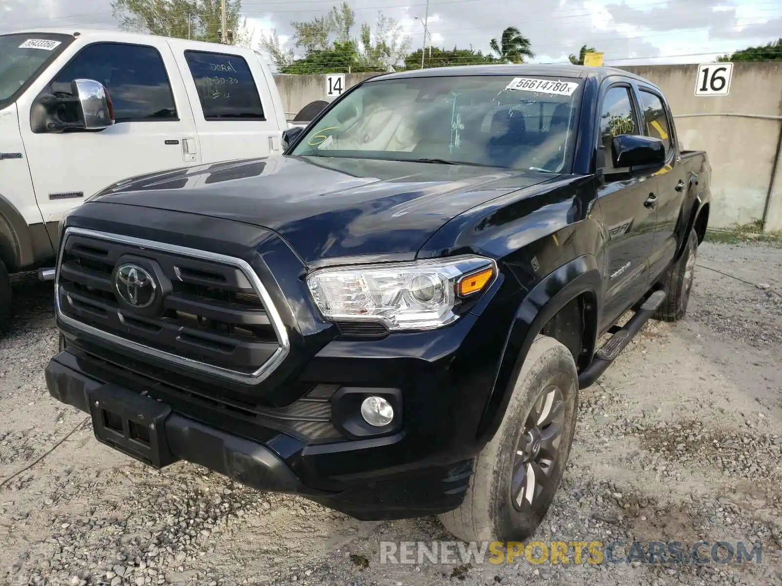 2 Photograph of a damaged car 3TMAZ5CN1KM079001 TOYOTA TACOMA 2019