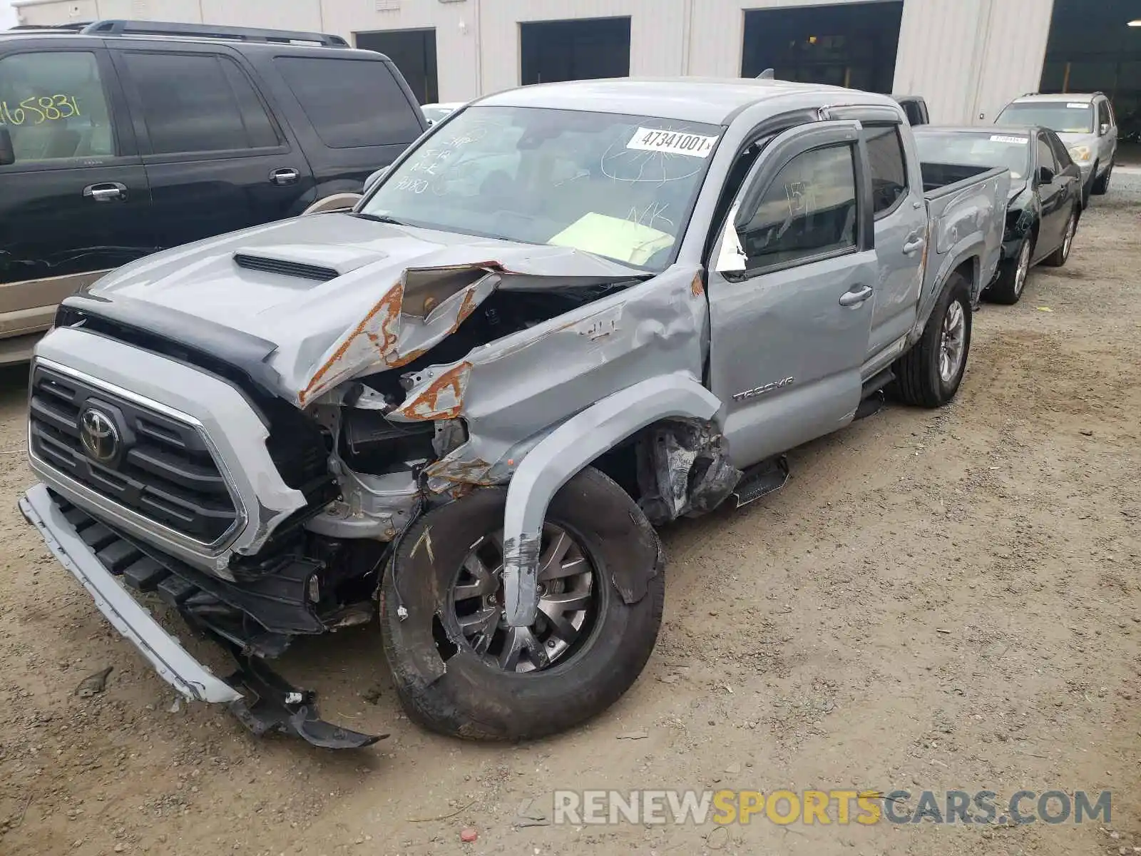 2 Photograph of a damaged car 3TMAZ5CN1KM079080 TOYOTA TACOMA 2019