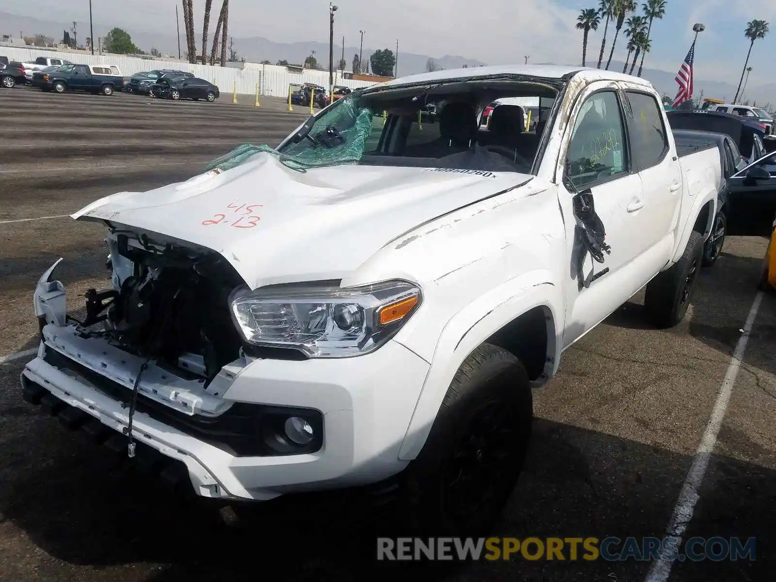 2 Photograph of a damaged car 3TMAZ5CN1KM079872 TOYOTA TACOMA 2019