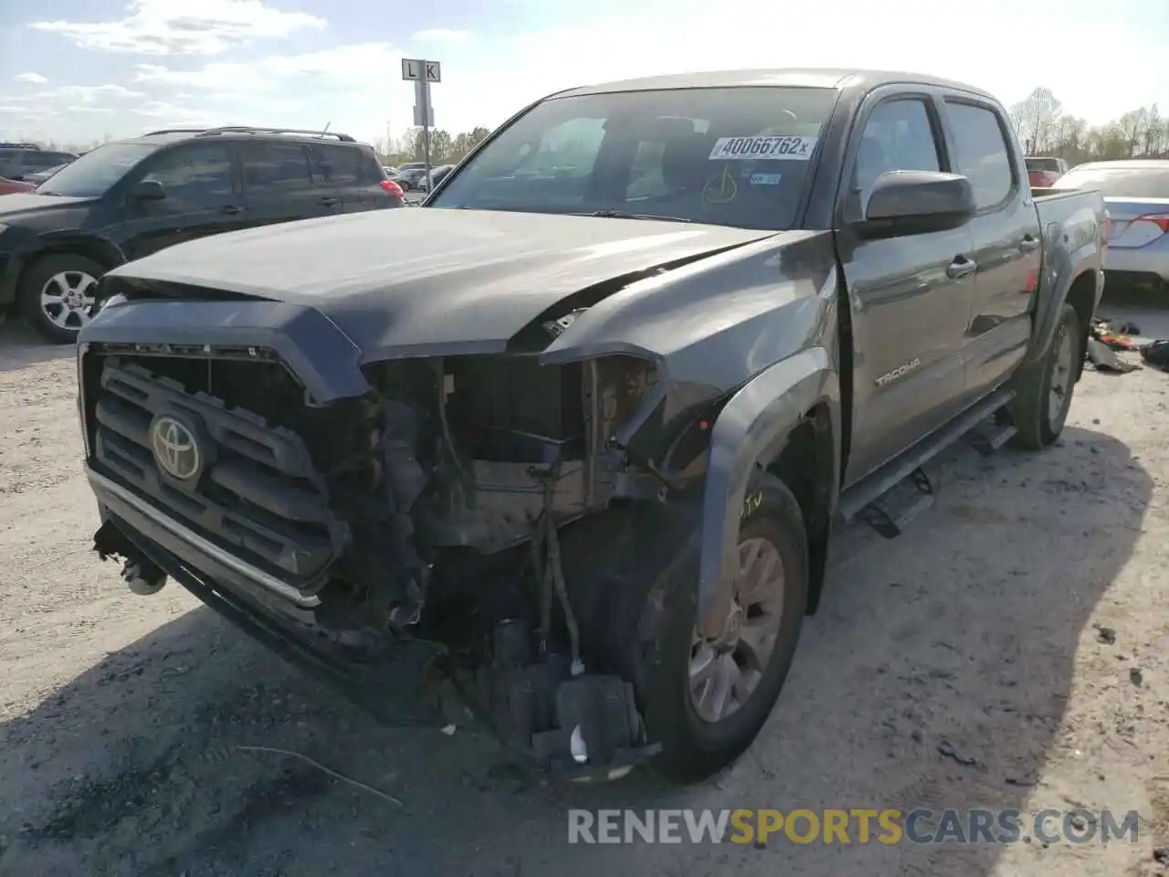 2 Photograph of a damaged car 3TMAZ5CN1KM080018 TOYOTA TACOMA 2019