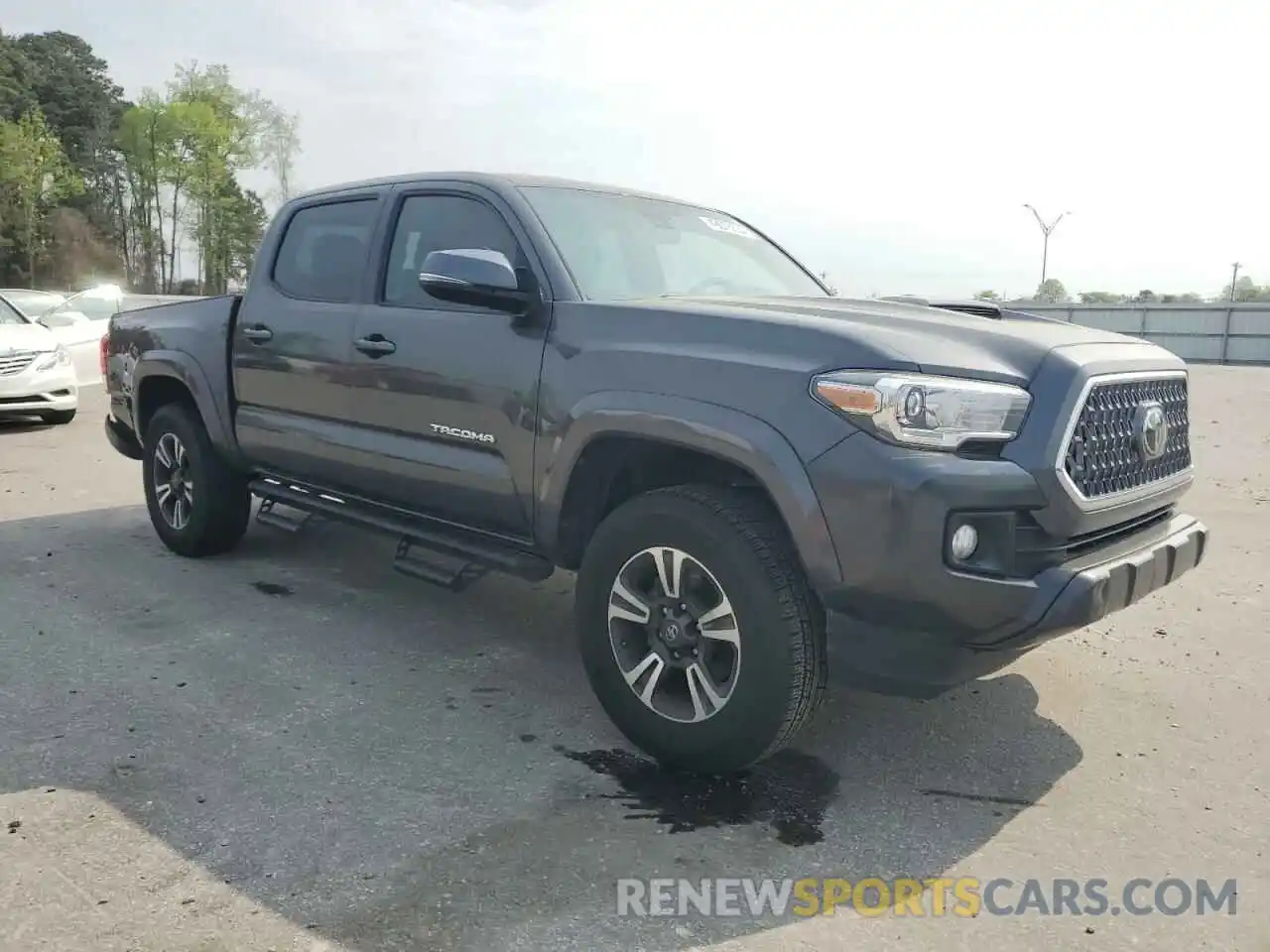 4 Photograph of a damaged car 3TMAZ5CN1KM085137 TOYOTA TACOMA 2019