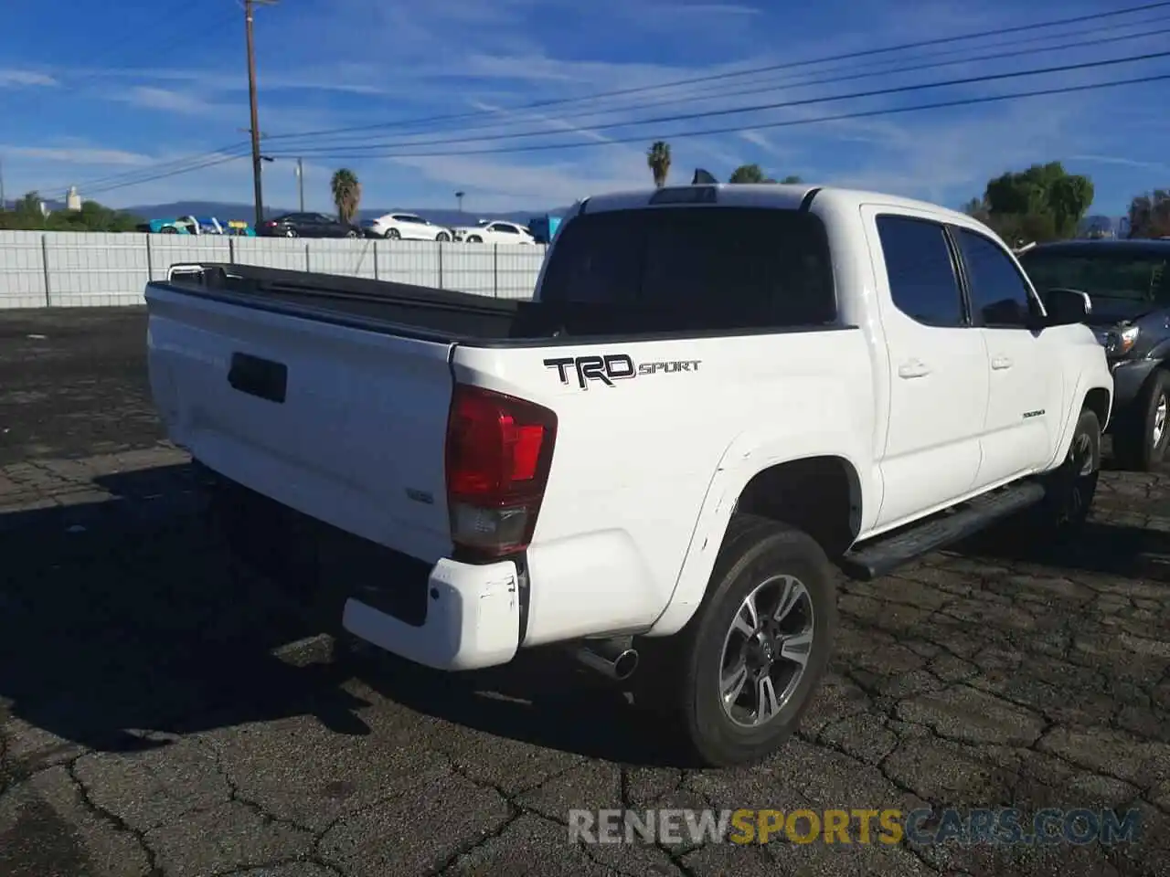 4 Photograph of a damaged car 3TMAZ5CN1KM091648 TOYOTA TACOMA 2019