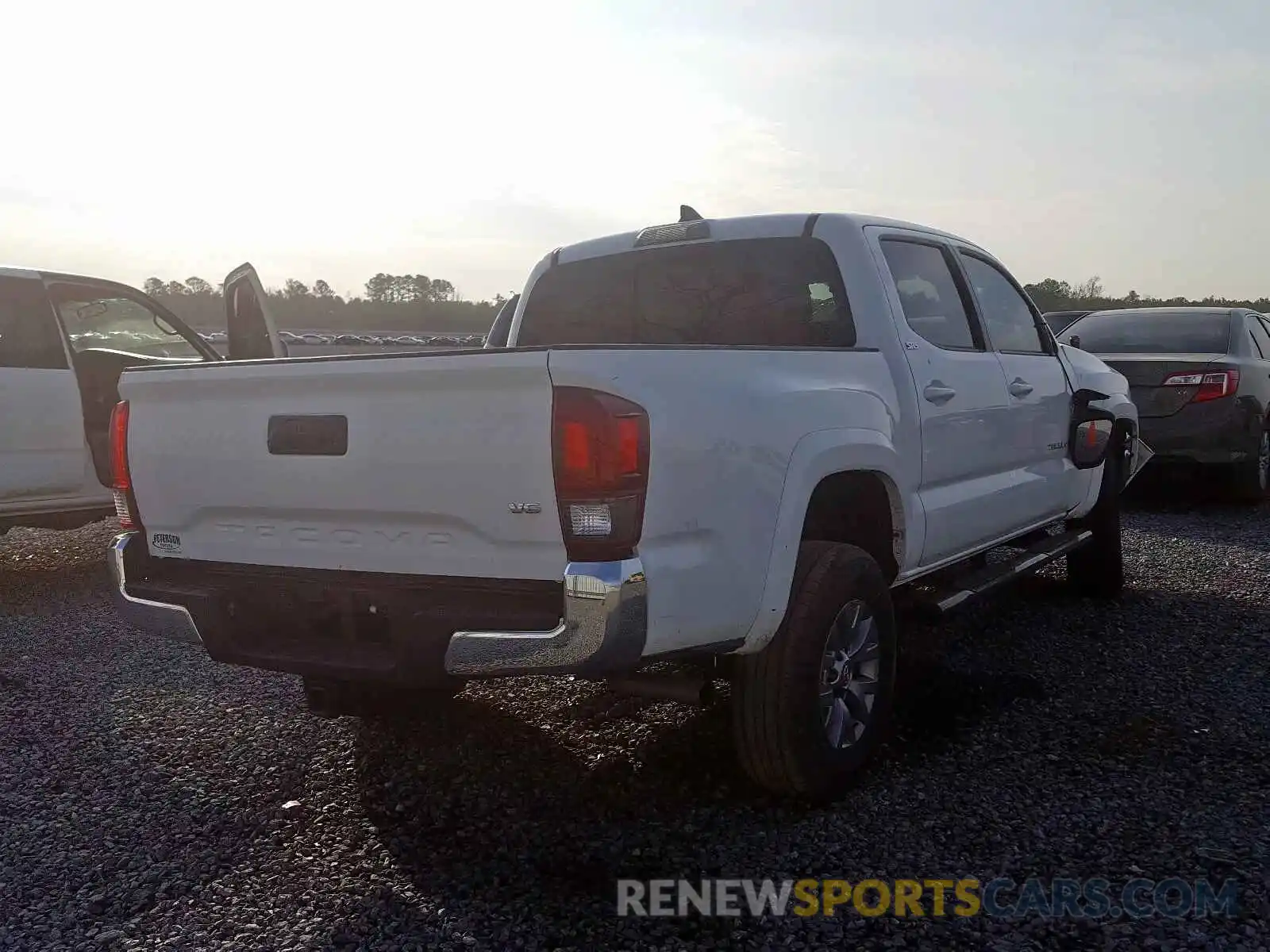 4 Photograph of a damaged car 3TMAZ5CN1KM091732 TOYOTA TACOMA 2019