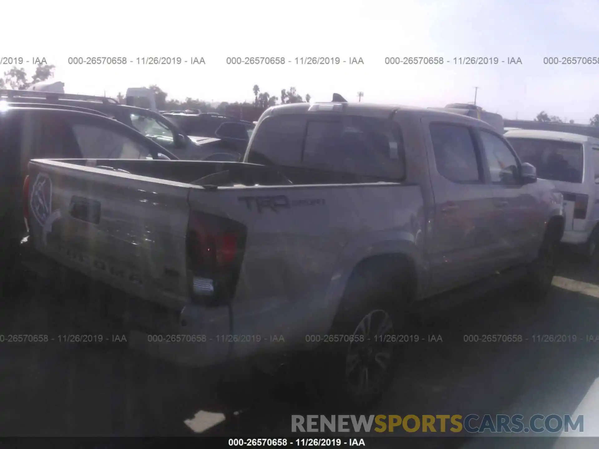 4 Photograph of a damaged car 3TMAZ5CN1KM092010 TOYOTA TACOMA 2019